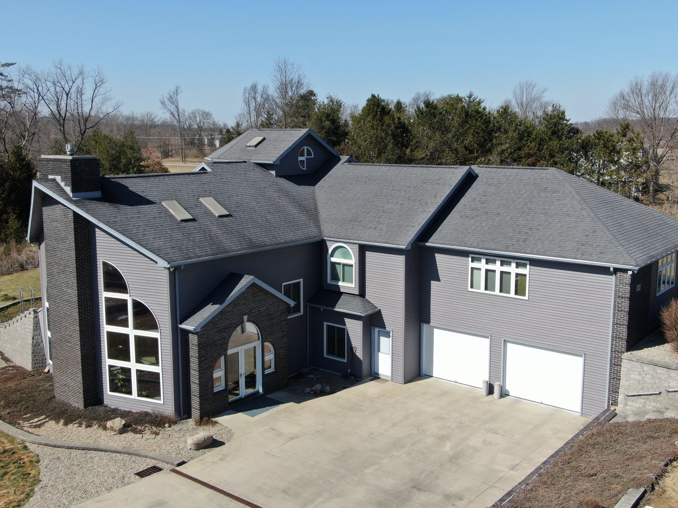 Residential Roofing Installation using Vic West Nothridge Slate by 4Ever Metal Roofing