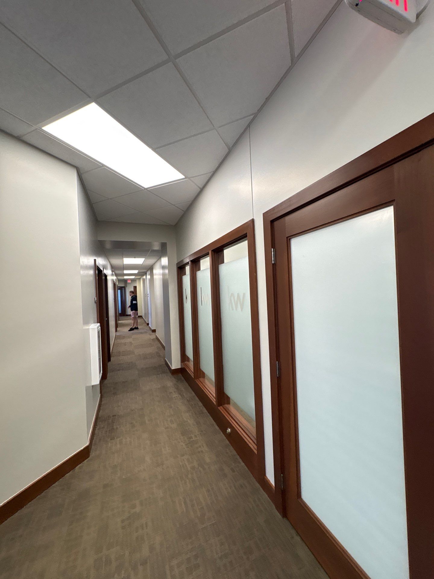 Commercial Office Interior Remodel and Modern Suite Refresh in Sioux Falls by Select Painting, Coatings & Garage Cabinets