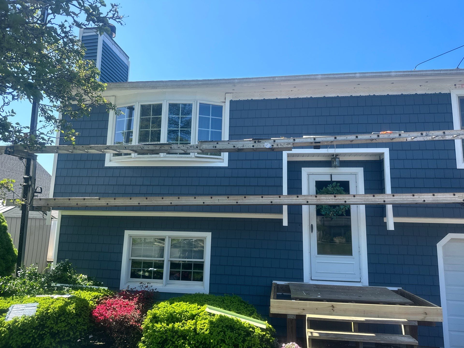 Siding Installation using Certainteed Cedar Impressions Straight Edge Perfection Shingles - D7 - Pacific Blue by A Plus Exterior