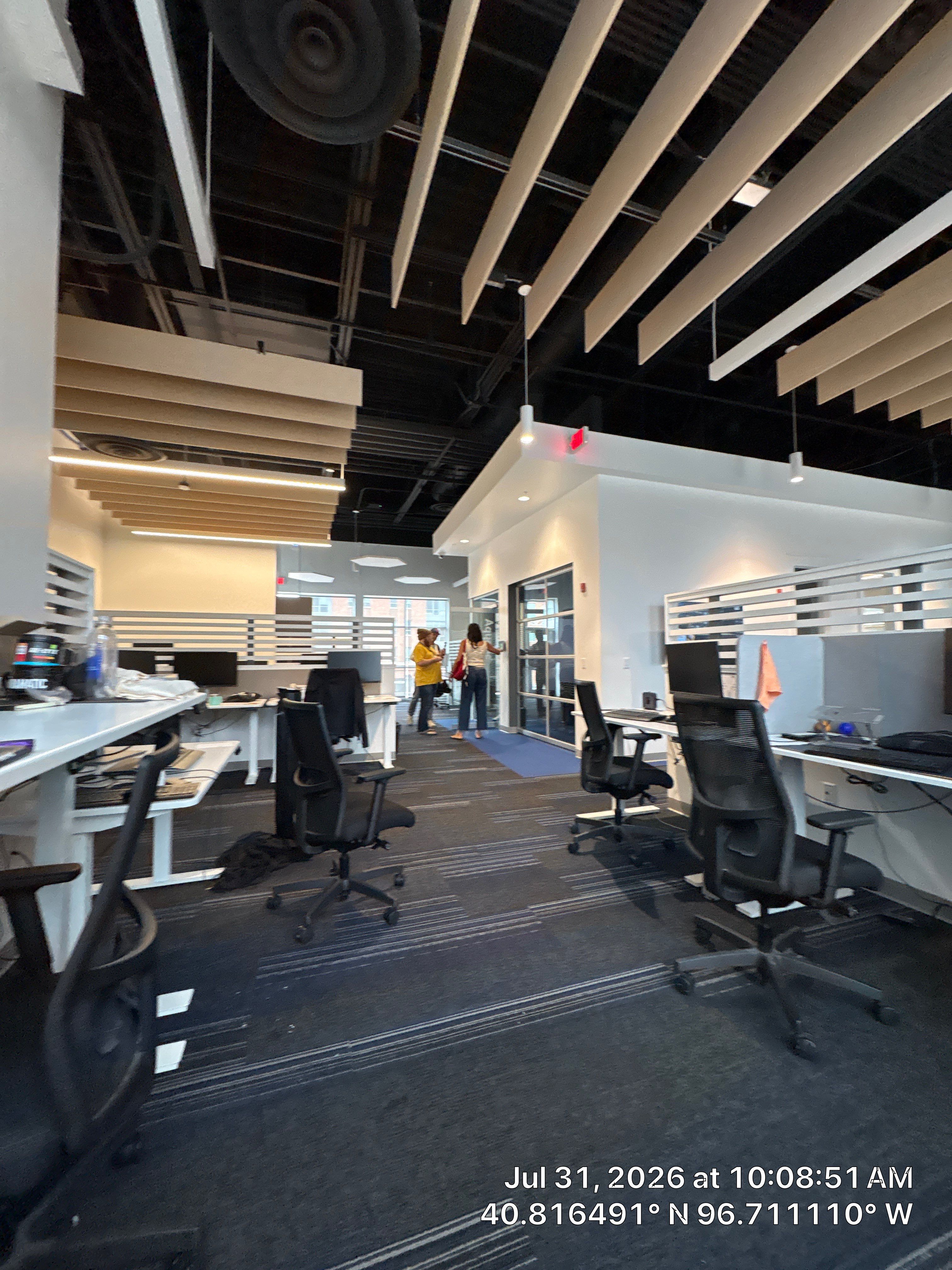 Modern Commercial Office Fit-Out with Acoustic Baffles in Lincoln by CompanyCam Sales Demo