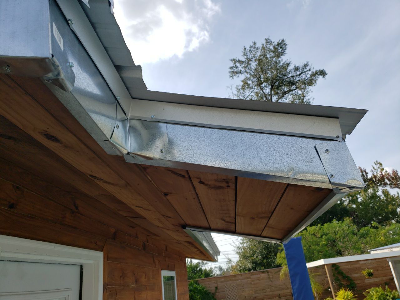 Gutter Installation using K-Style Seamless Gutters and Soffit and Fascia Replacement by Gutter Professors
