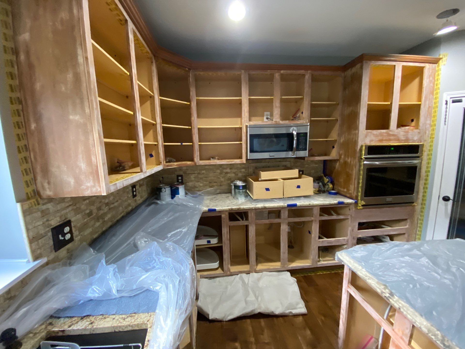Kitchen Cabinet Refinishing by Top Shelf Painter