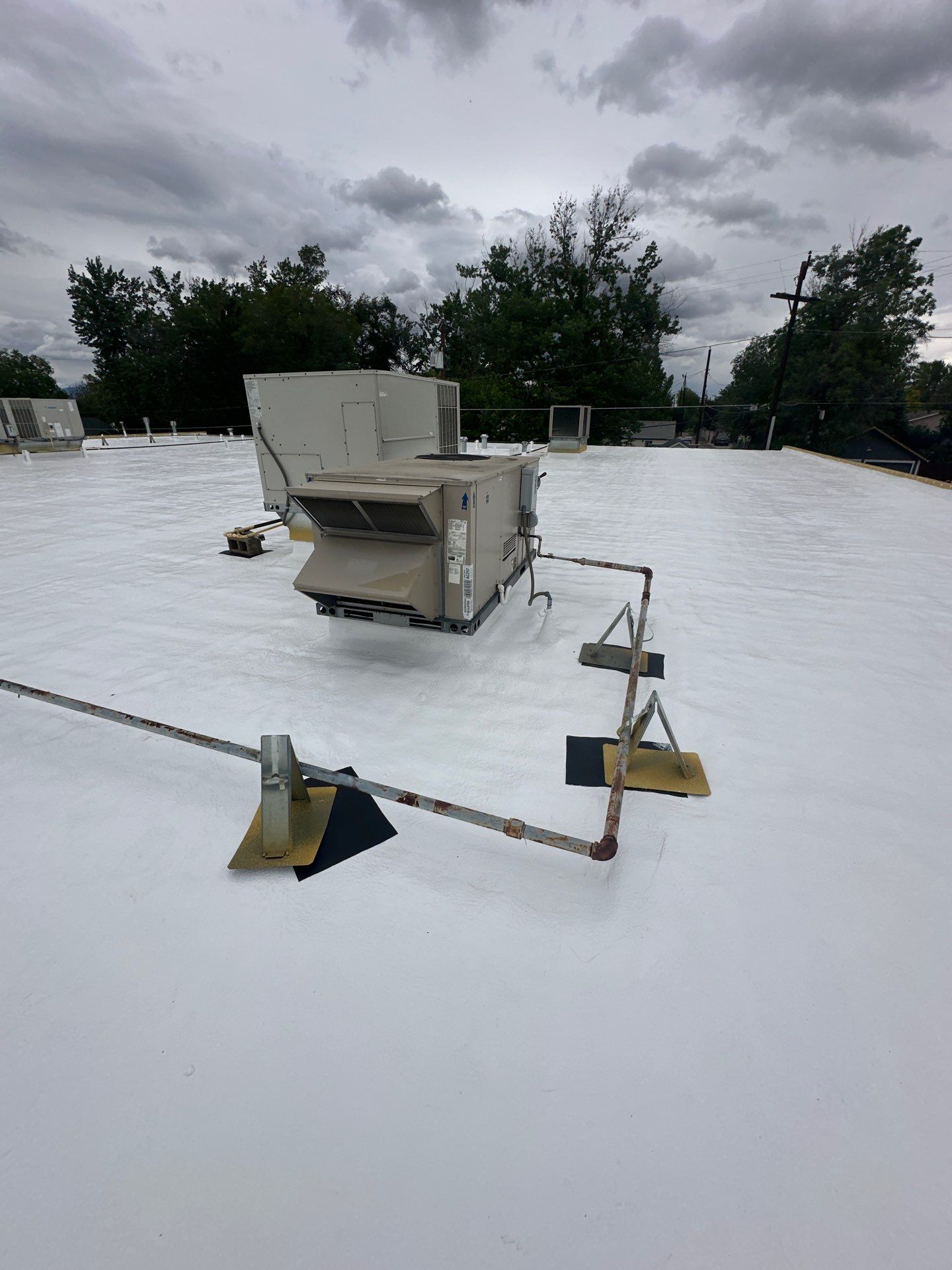 Complete Roof Coating System by Blue Peaks Roofing LLC