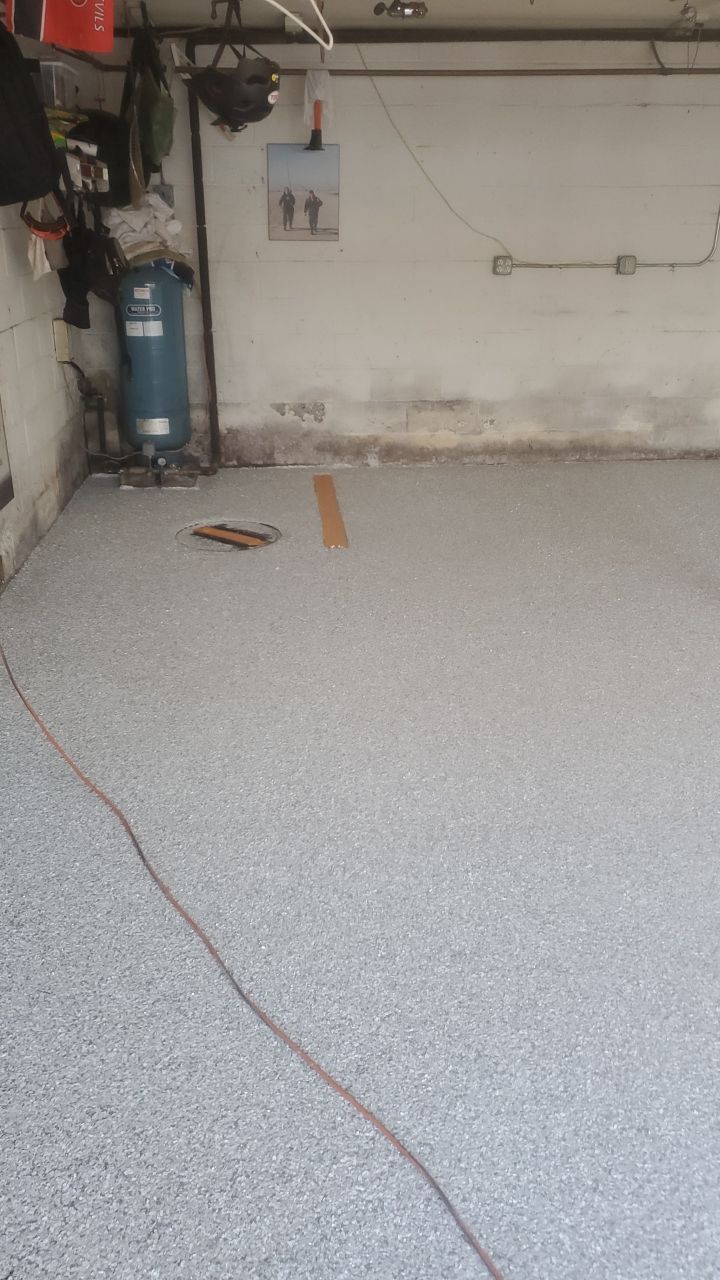 Garage Floor In Mt. Everest by Spectrum Painting, LLC
