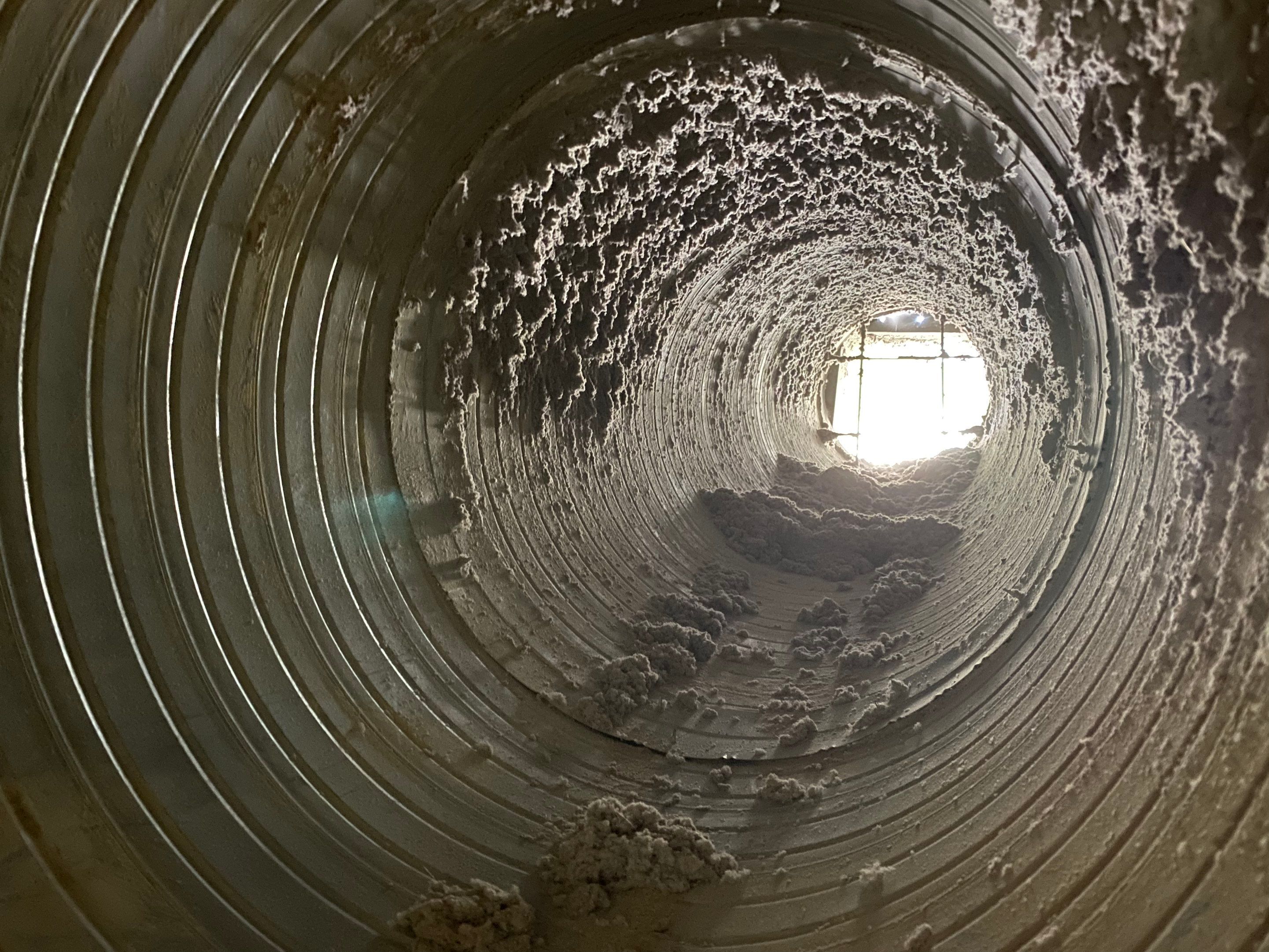 Laundromat Dryer Vent Deep Cleaning using Gas Powered Vac by Peach State Dryer Vents & Air Ducts