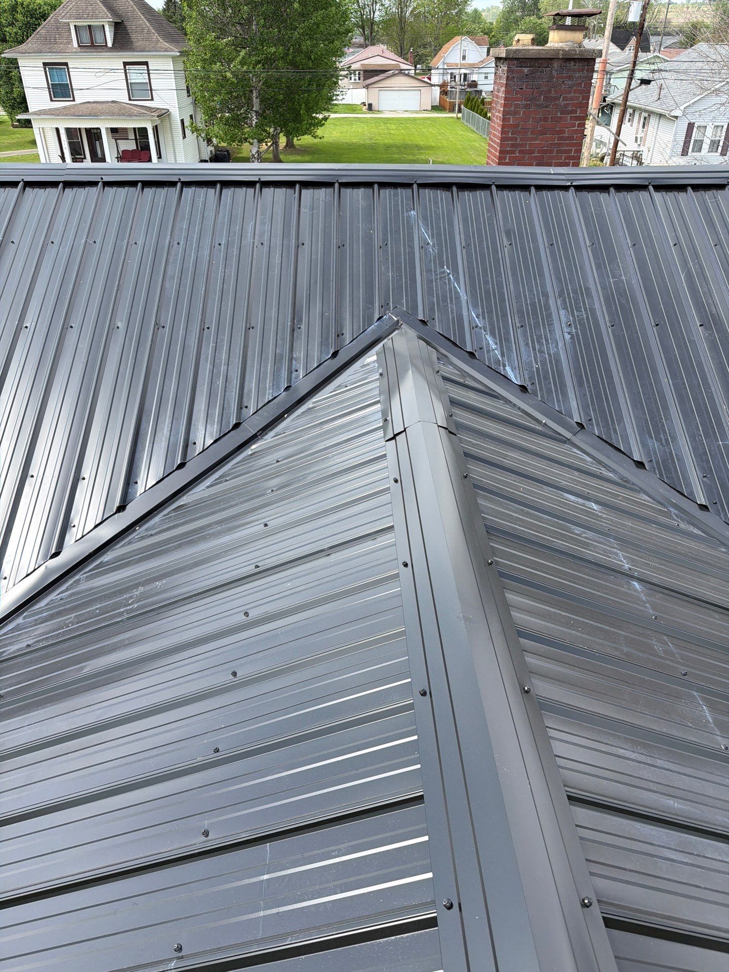 Residential Roofing Installation using Metal by Rainstoppers Roofing
