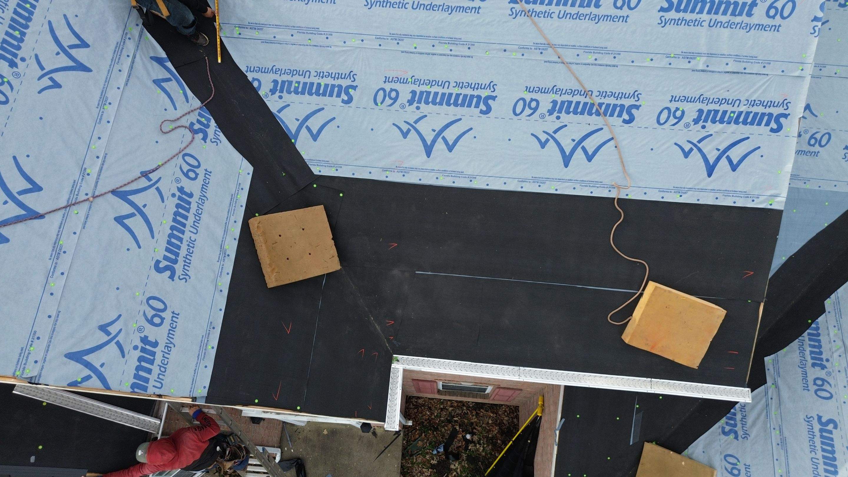 Walden Ponds - Pristine Black and Hydro Flo Gutter Guards by Tamlin Roofing