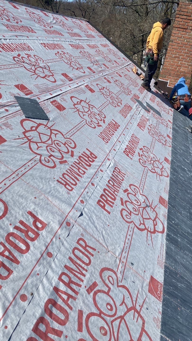 Residential Roofing Installation using Vermont Slate by A Plus Exterior