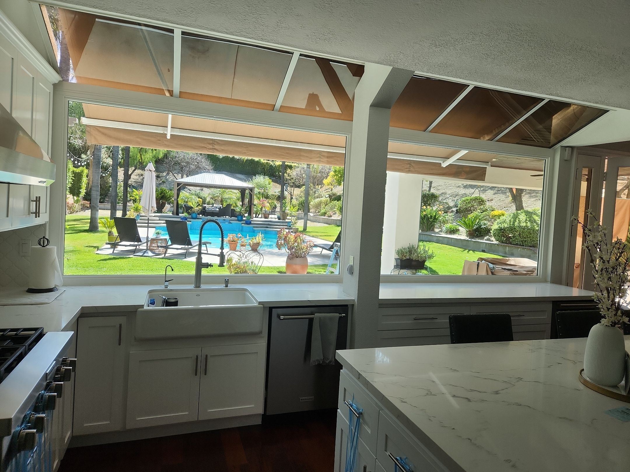 Window Installation using Anlin vinyl windows with Sunshield glass by American Window Company