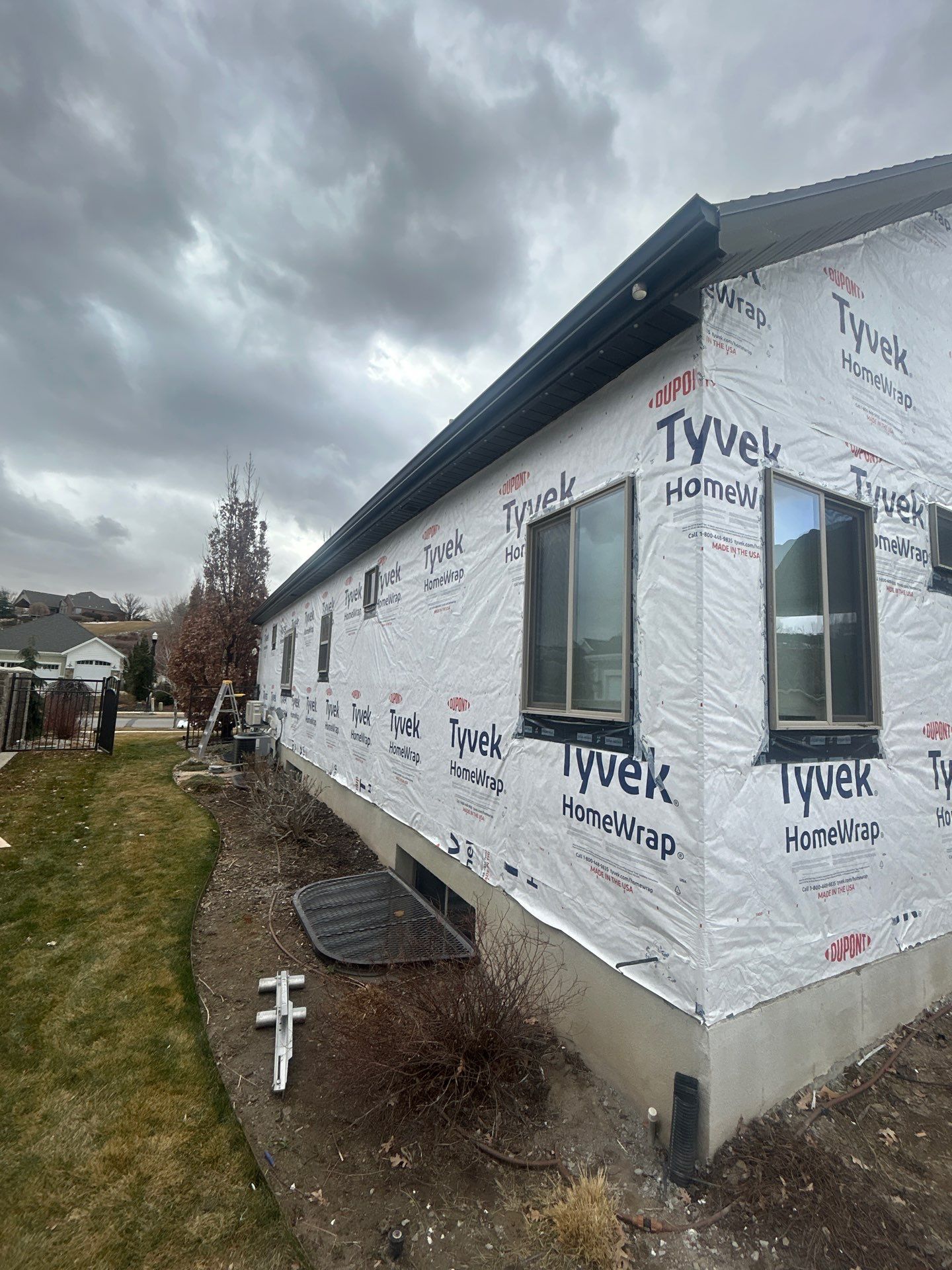 South Jordan | Massive Board & Batten Upgrade | Cobble Stone & Dark Bronze by Ideal Siding Utah