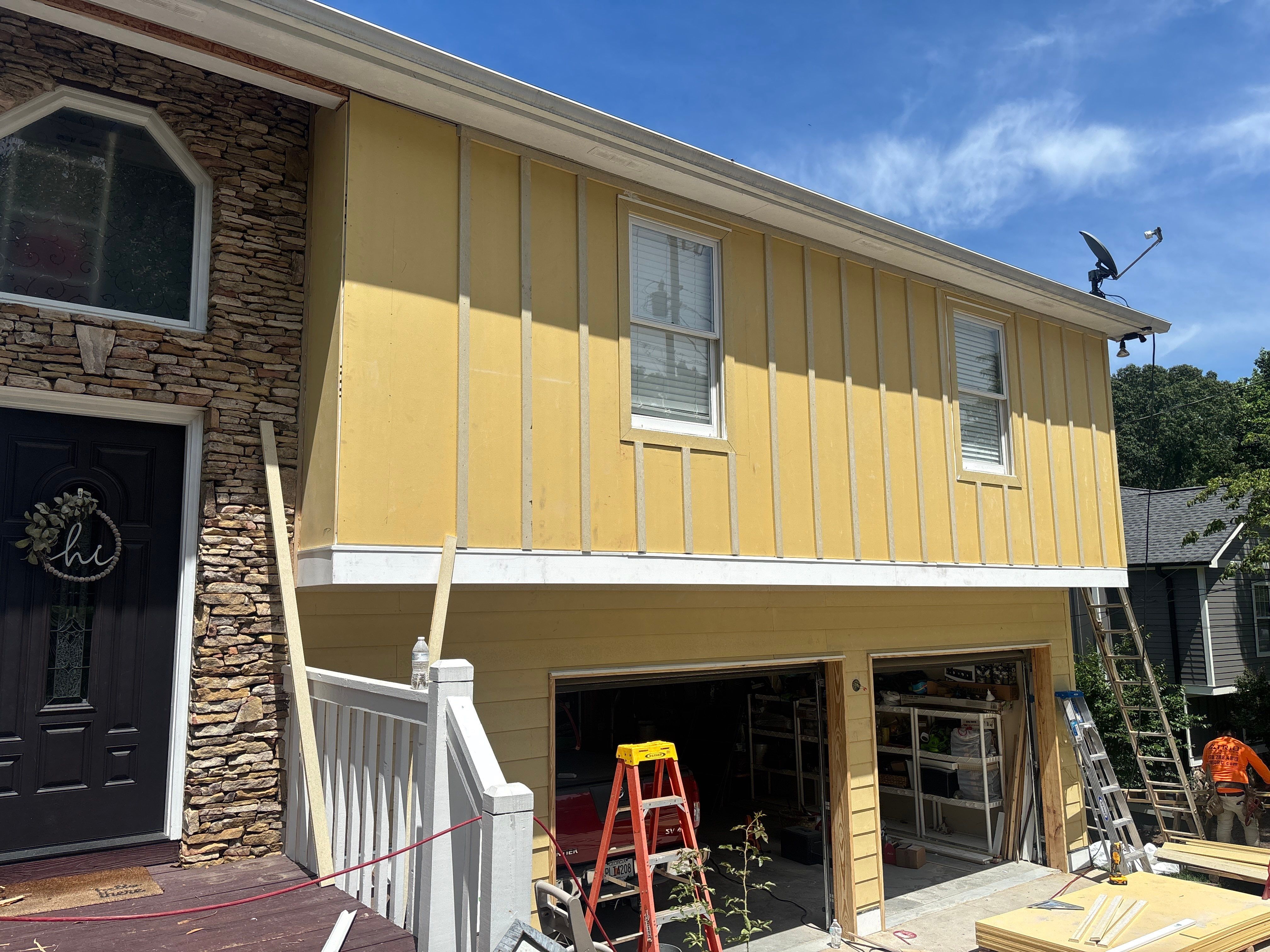 Siding replacement  by Deerfield Roofing LLC