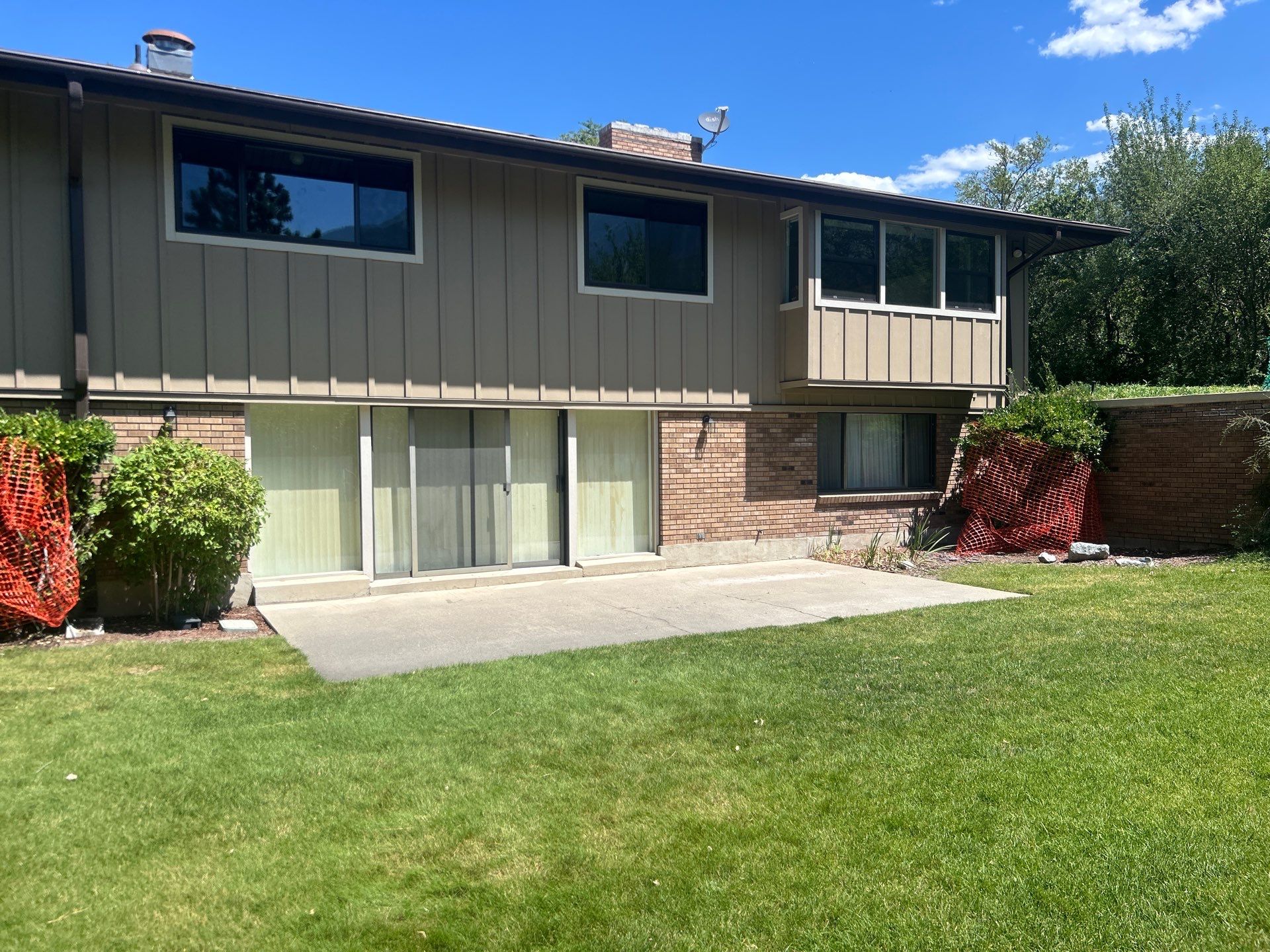 Complete Hardie Colorplus Board and Batten replacement with Custom Soffit Transformation in Sandy by Ideal Siding Utah
