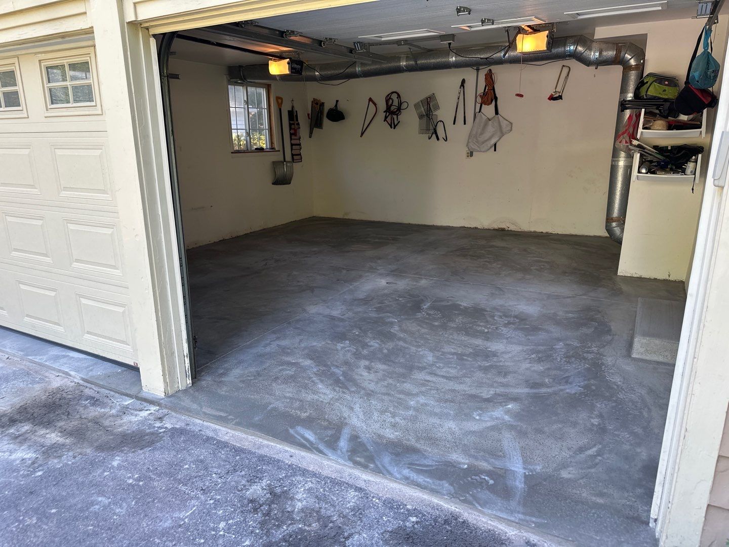 Concrete garage floor replacement   by NG Masonry & Construction LLC