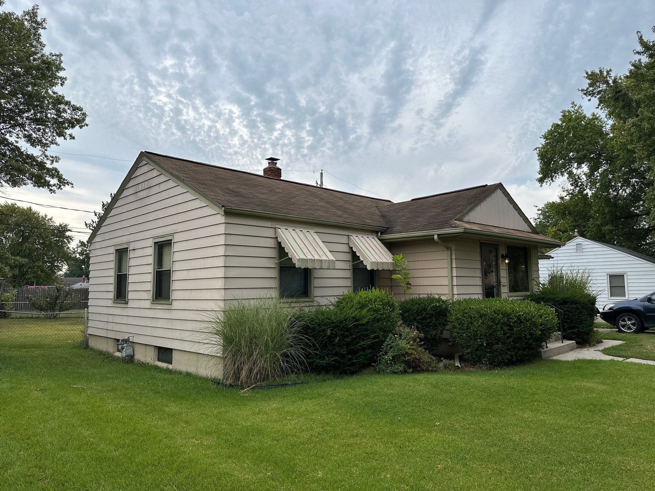 Residential Roofing Installation using Exposed Fastener Metal Roof by 4Ever Metal Roofing