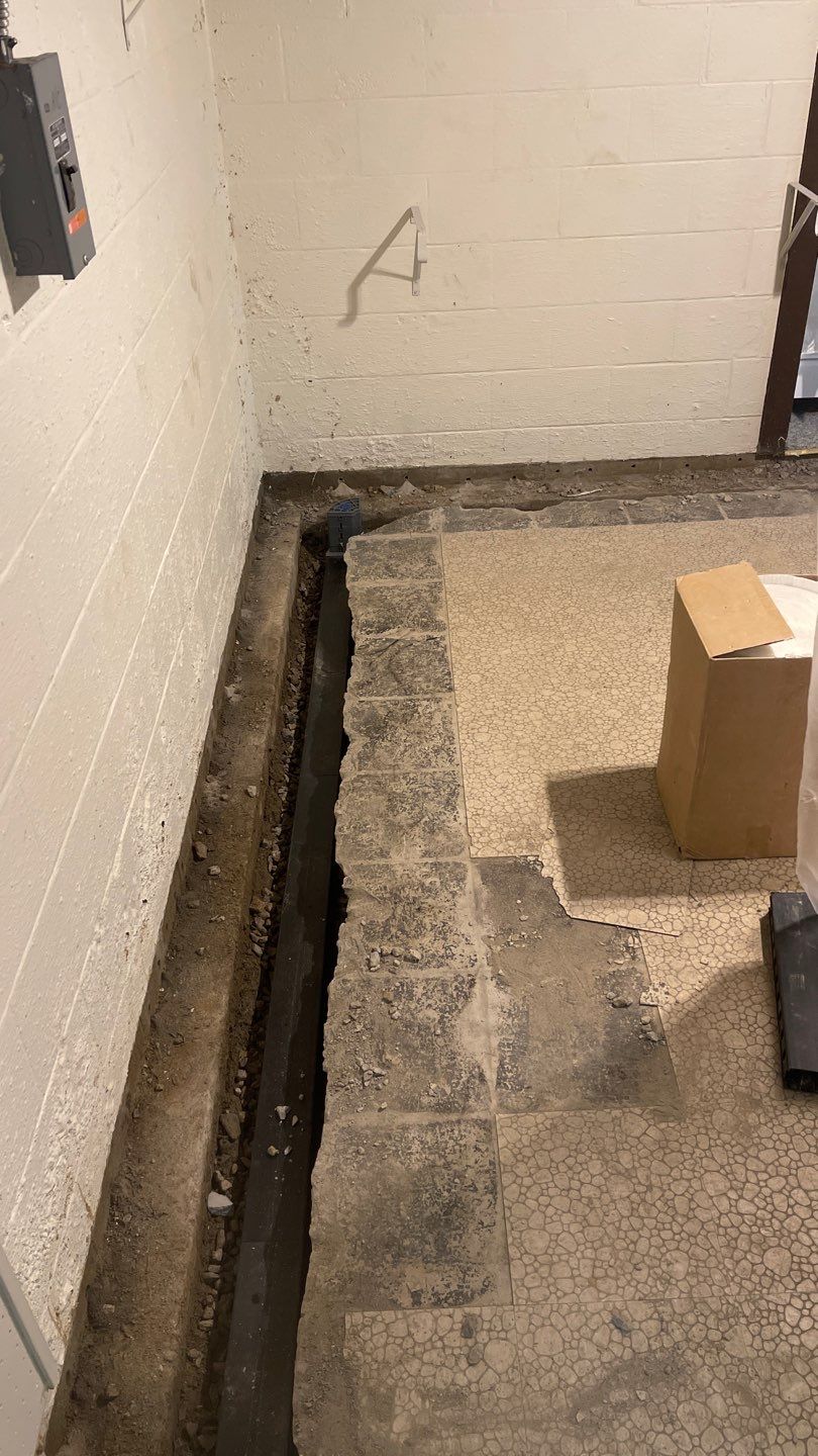 Interior Waterproofing Using GrateDrain™ Products by Toledo Basement Repair 
