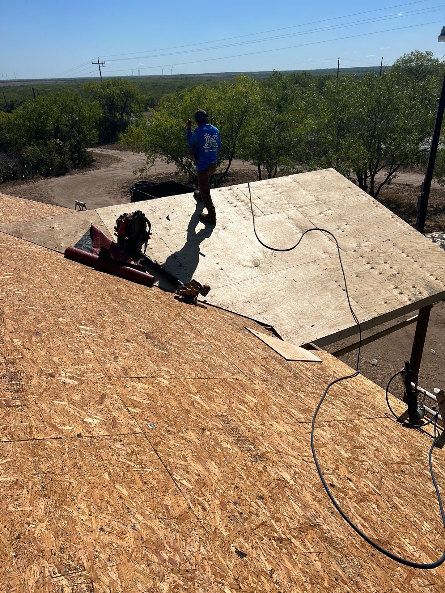 Front Porch Sitt'n by Bayfront Roofing and Construction