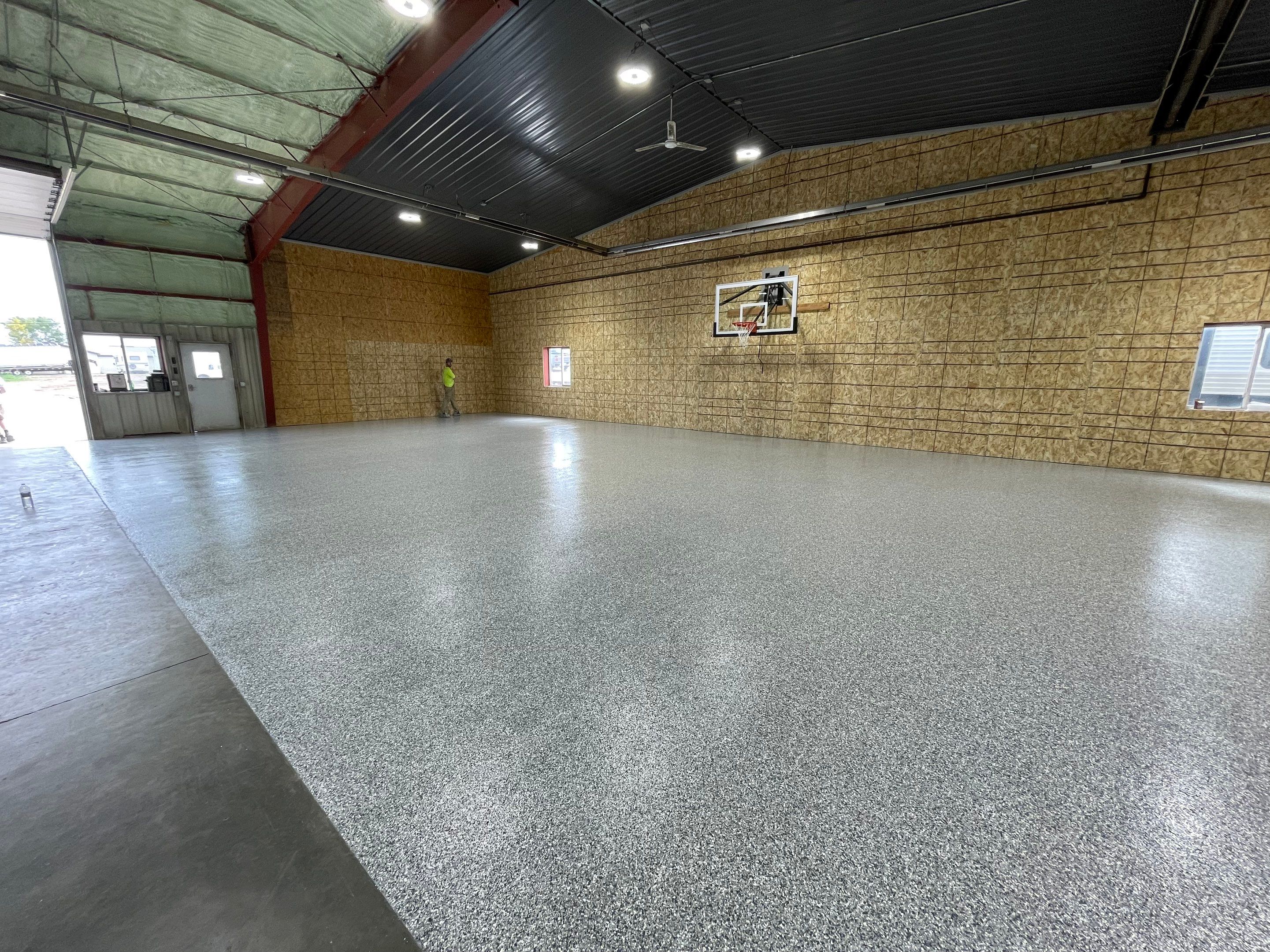 Custom Polyurea Shop Floor with Basketball Court Lines in Rock Valley by Select Painting, Coatings & Garage Cabinets