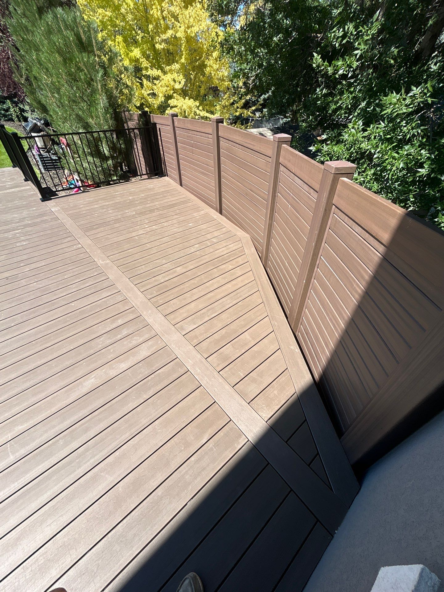 Deck Build Over Concrete Patio by SAGE Decks