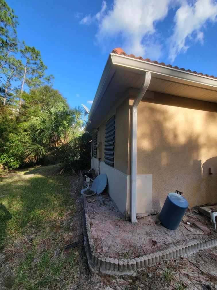 New Splash Guards and 6-Inch seamless Gutters in Naples FL by Gutter Professors