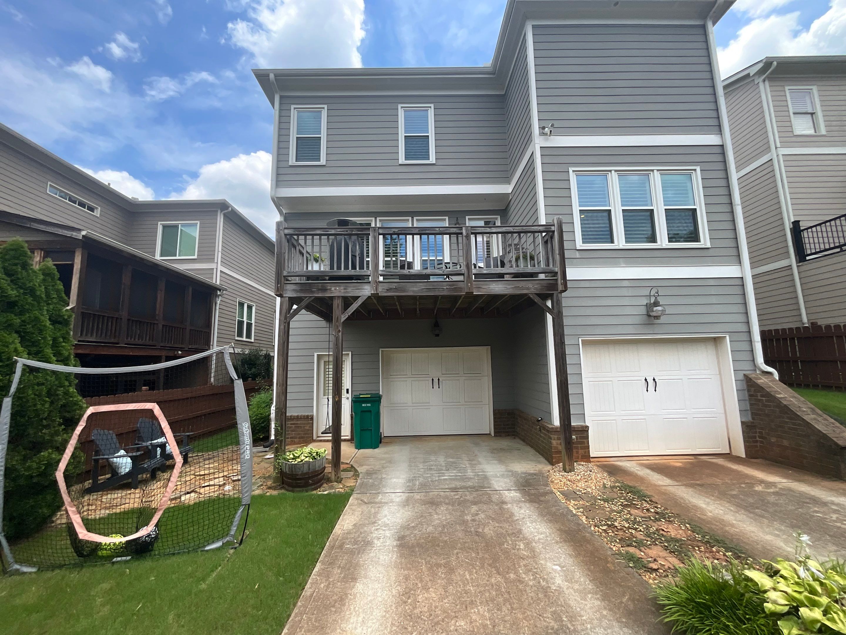 Elevated Composite Deck Replacement with Metal Railings in Smyrna by Swift Home Renovations 