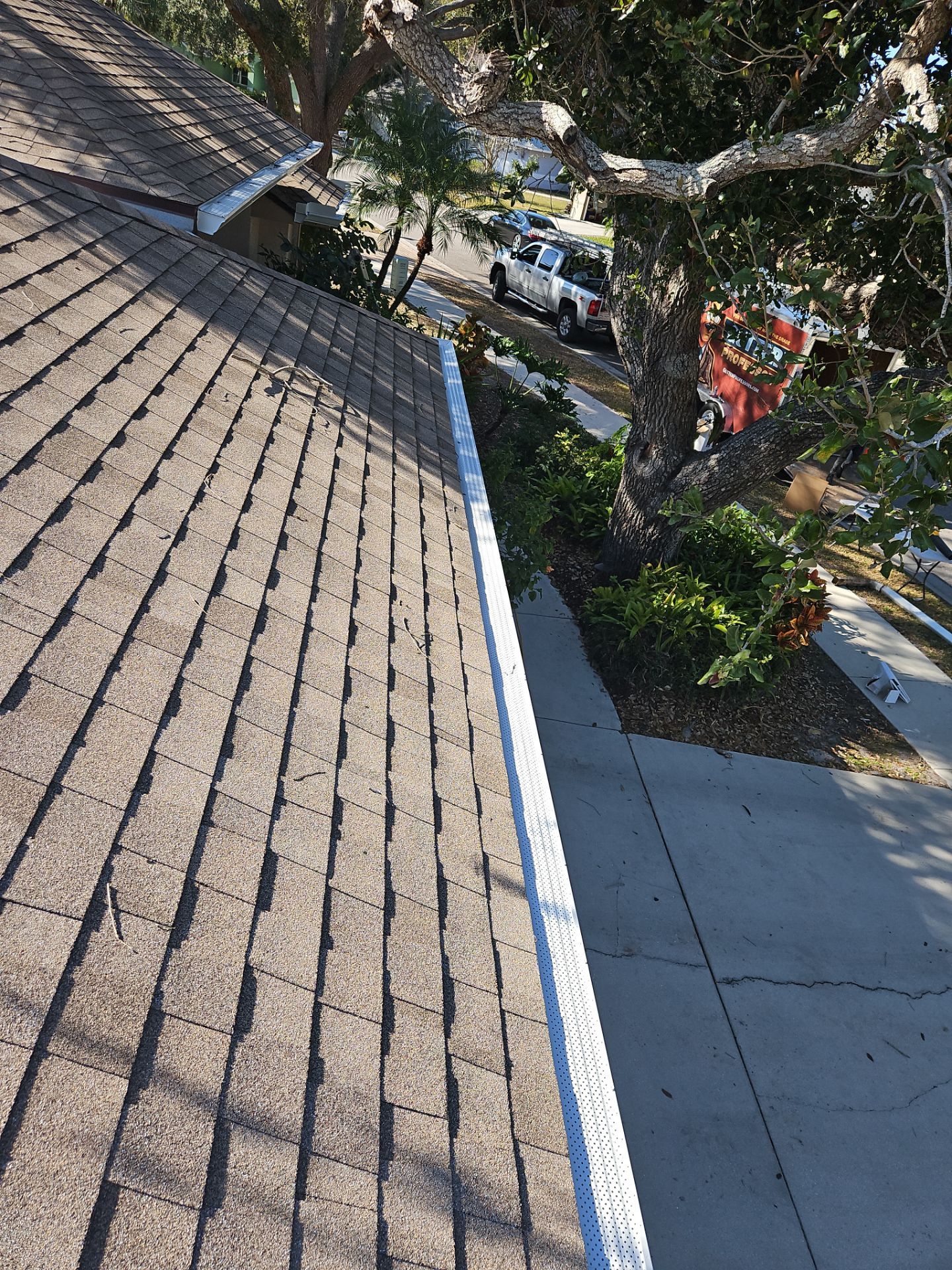 Seamless Aluminum Gutter Installation using 6 Inch Seamless Gutters in Sarasota FL by Gutter Professors