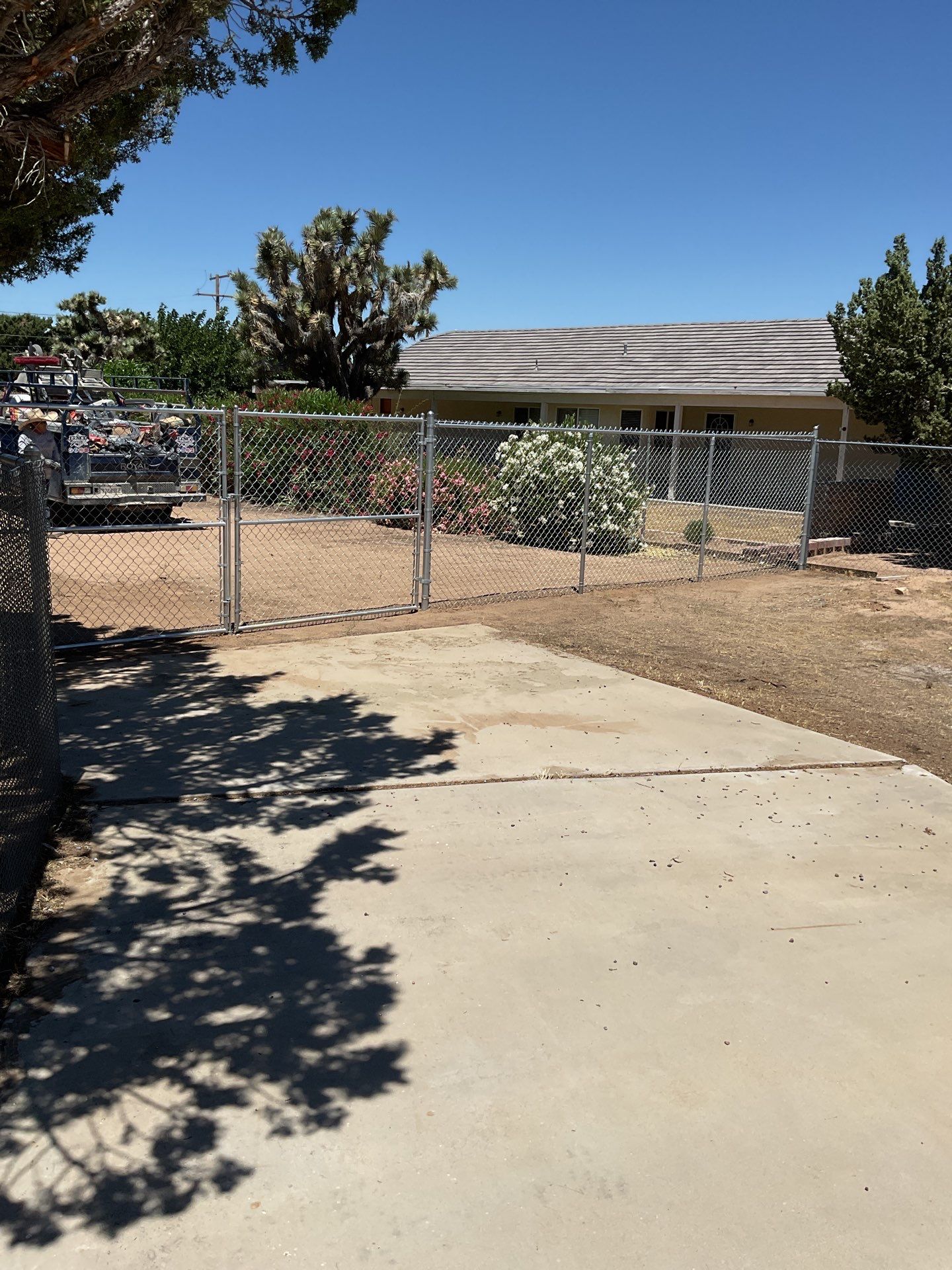 Chain link gate installation using chain -link by Fence Guys Inc. 
