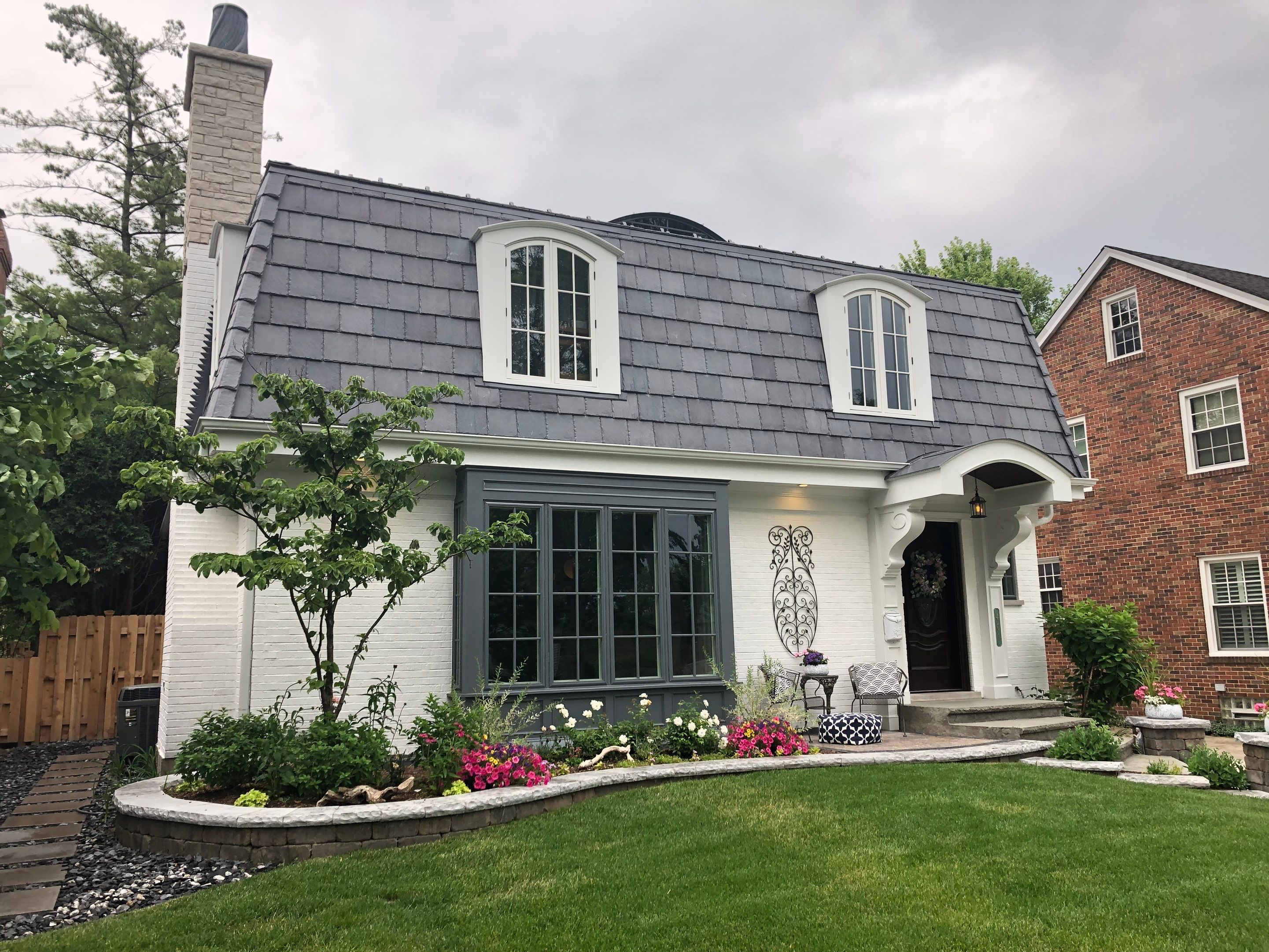 Elmhurst Home Exterior Renovation with Hardie Siding and New Portico by Great American Exteriors