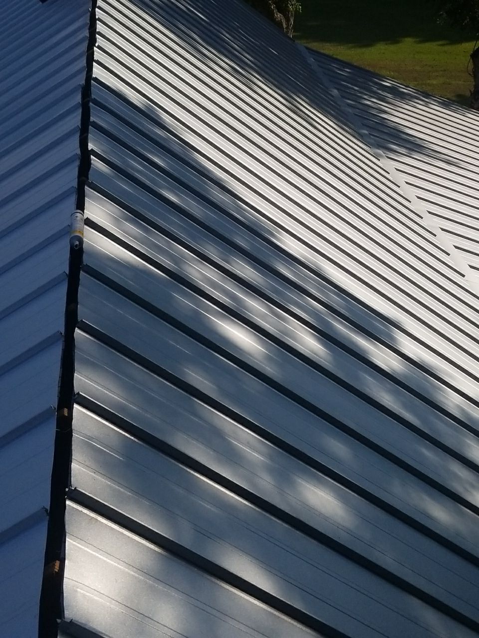 Residential Roofing Installation using Metal roofing by American Roofing & Construction LLC