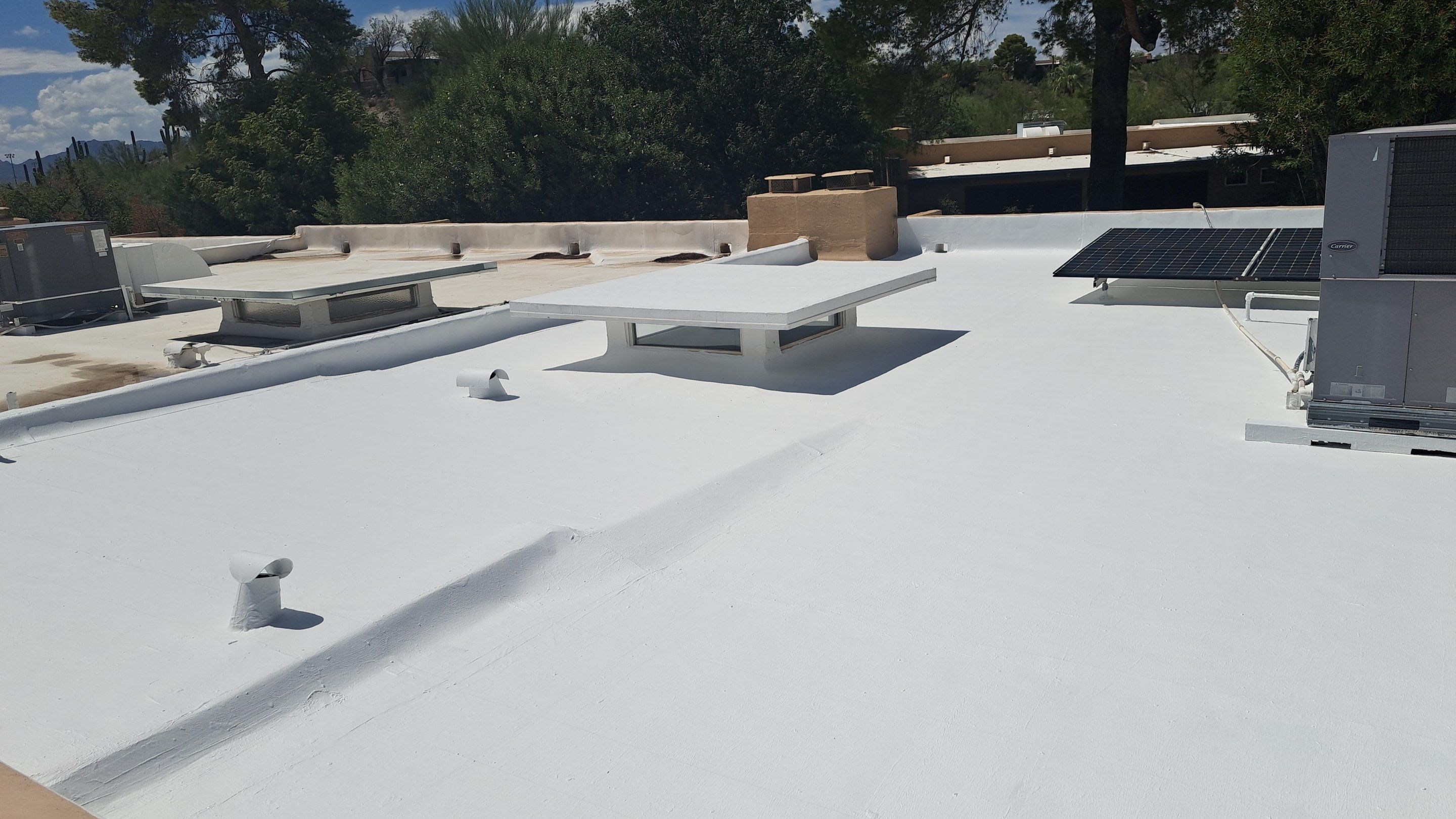 Tucson Residential Low Slope Roof Restoration and Solar Installation by West Coast Roofing AZ