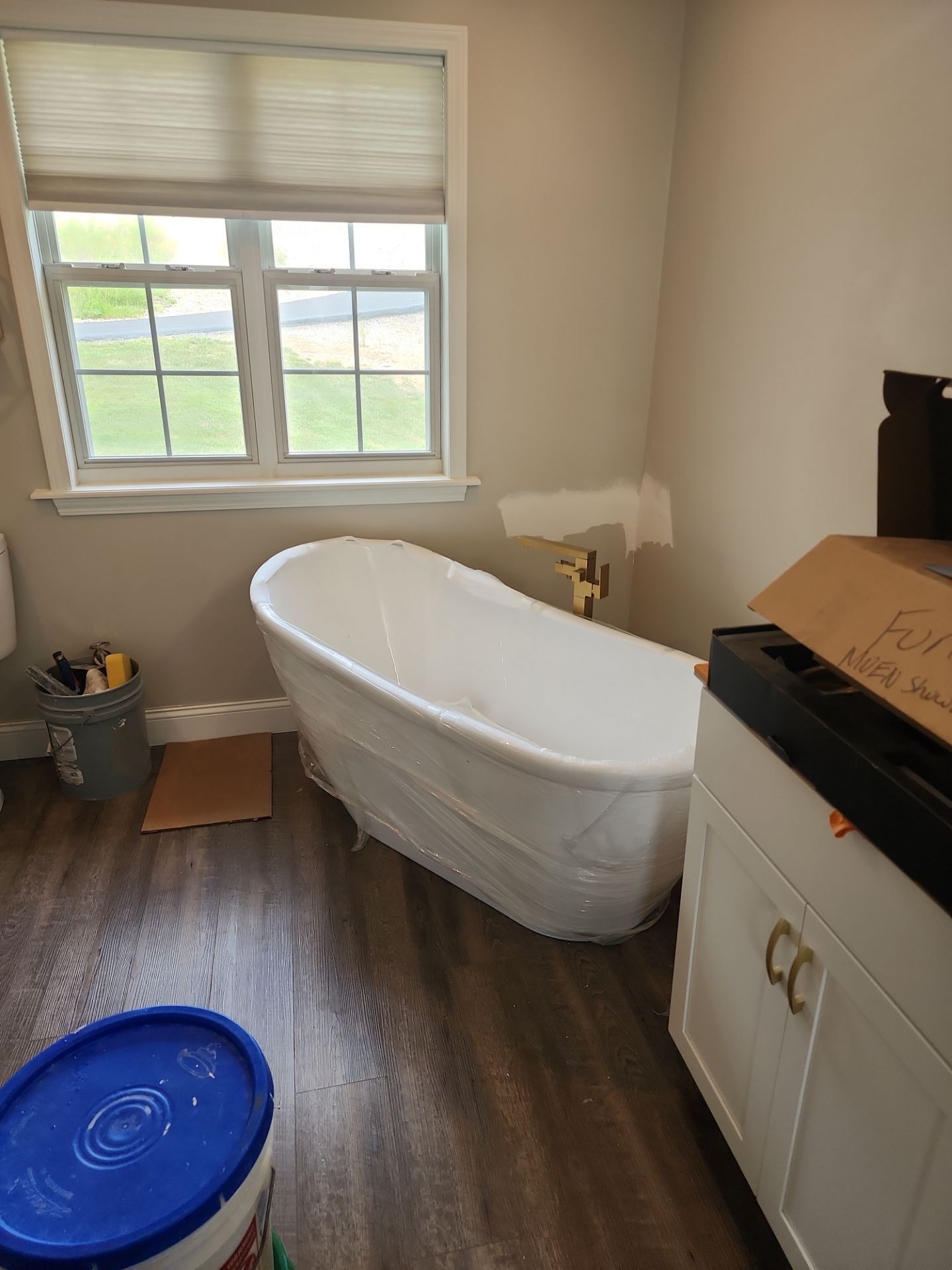 Master Bathroom Renovation Featuring Dark Textured Shower Panels in Branson West by Kitchen Works LLC