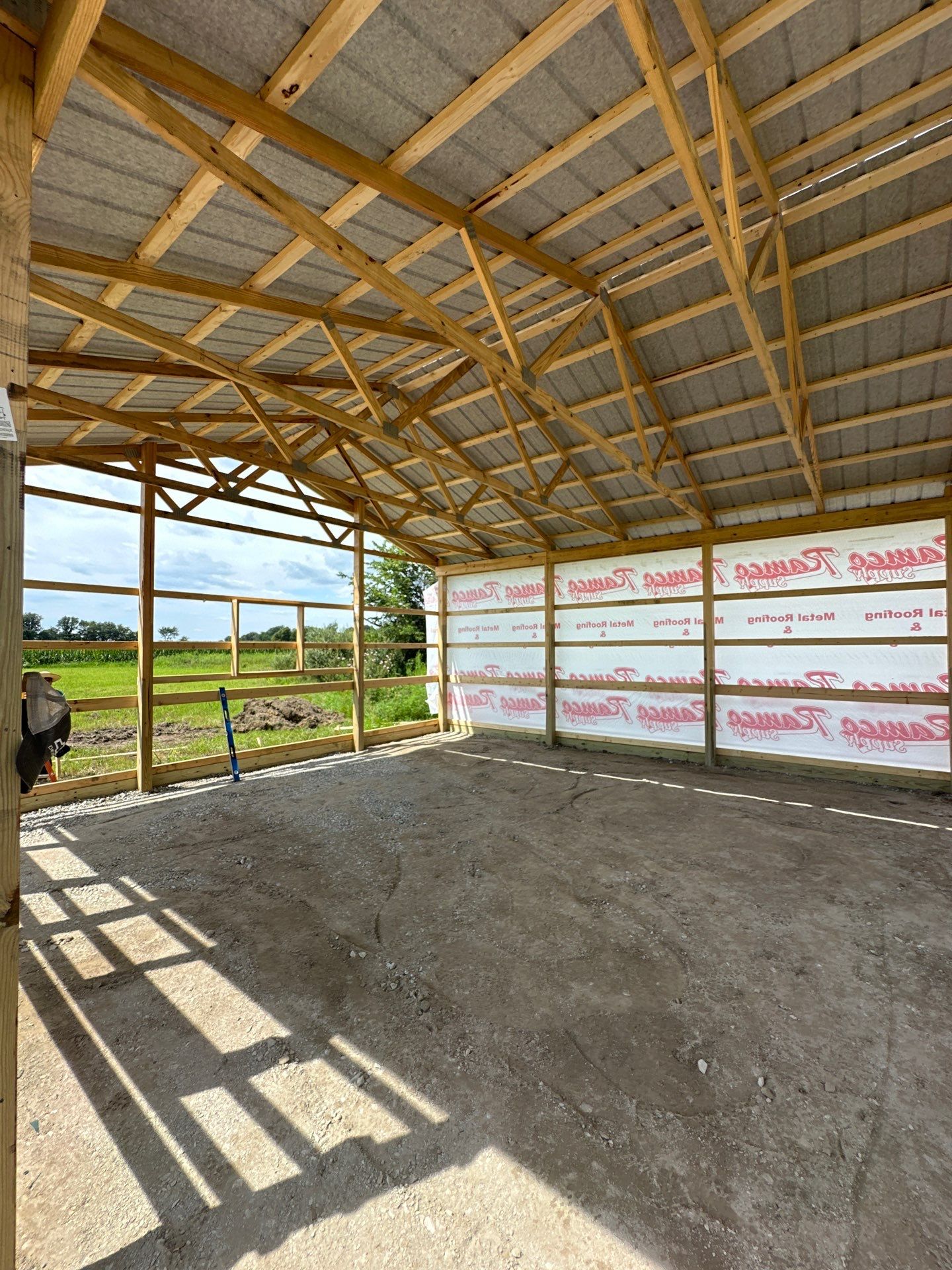Custom Post-Frame Pole Barn with Concrete Floor in Greenfield by The Barn Builders