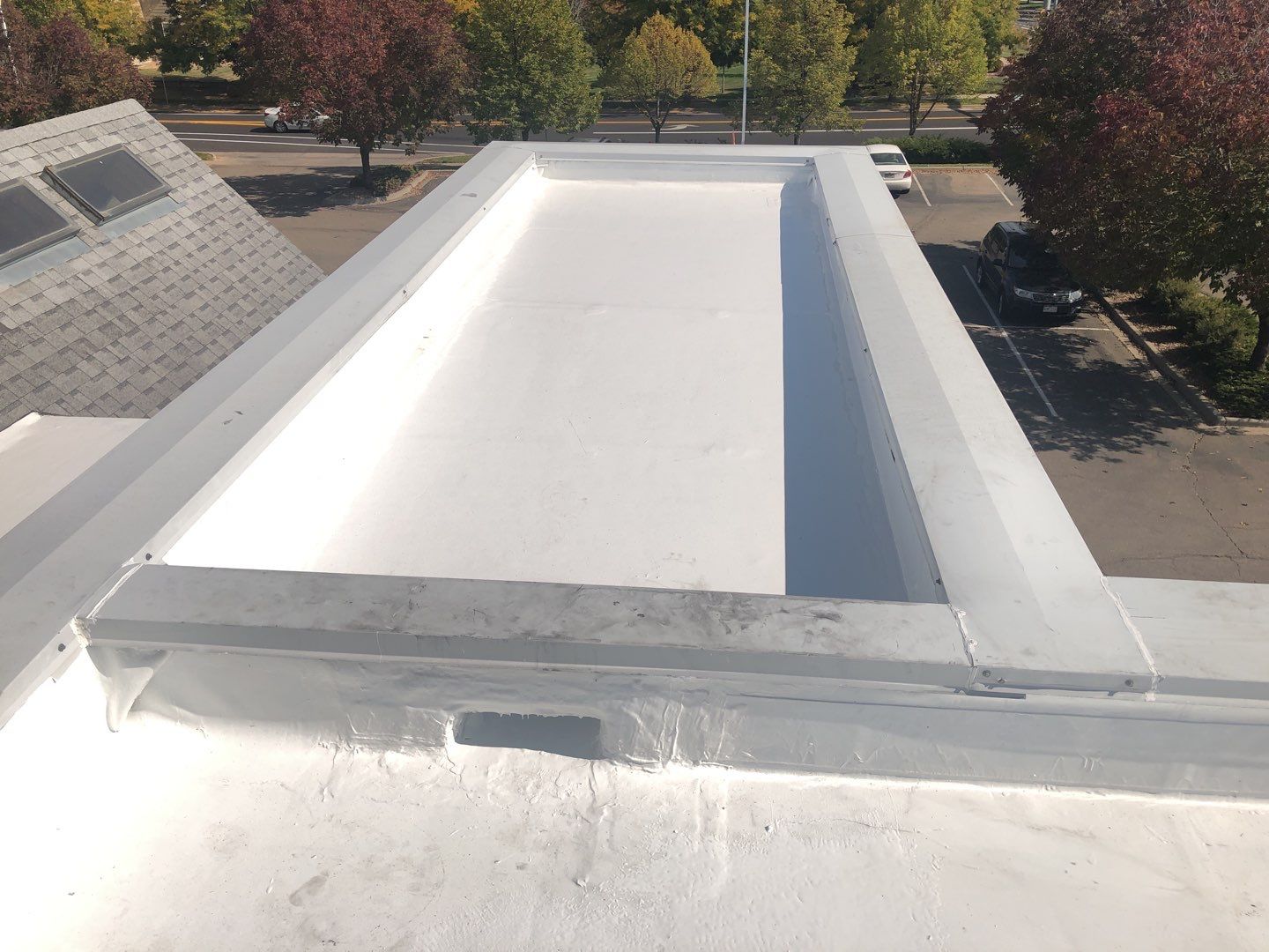 Commercial Roofing Installation using American Standard Coating - S  by A to Z Roofing
