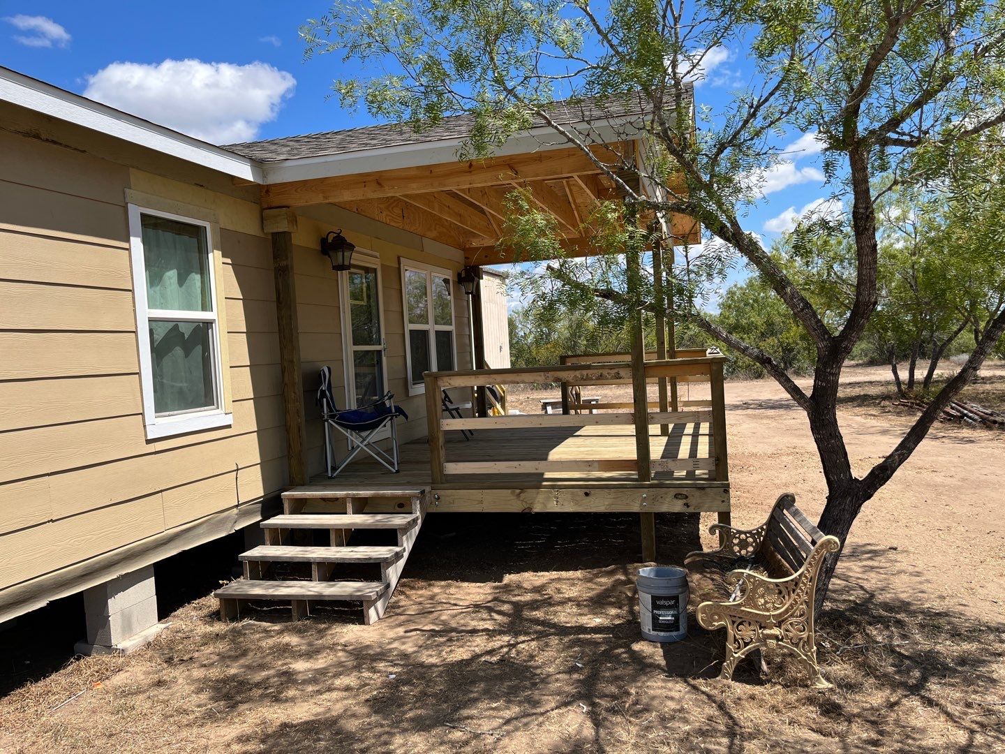Front Porch Sitt'n by Bayfront Roofing and Construction