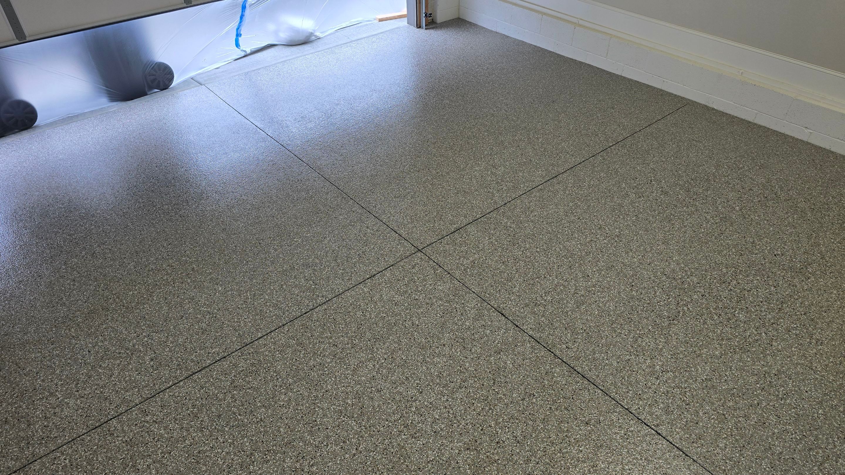 Garage Using Creekbed by Elite Floor Solutions