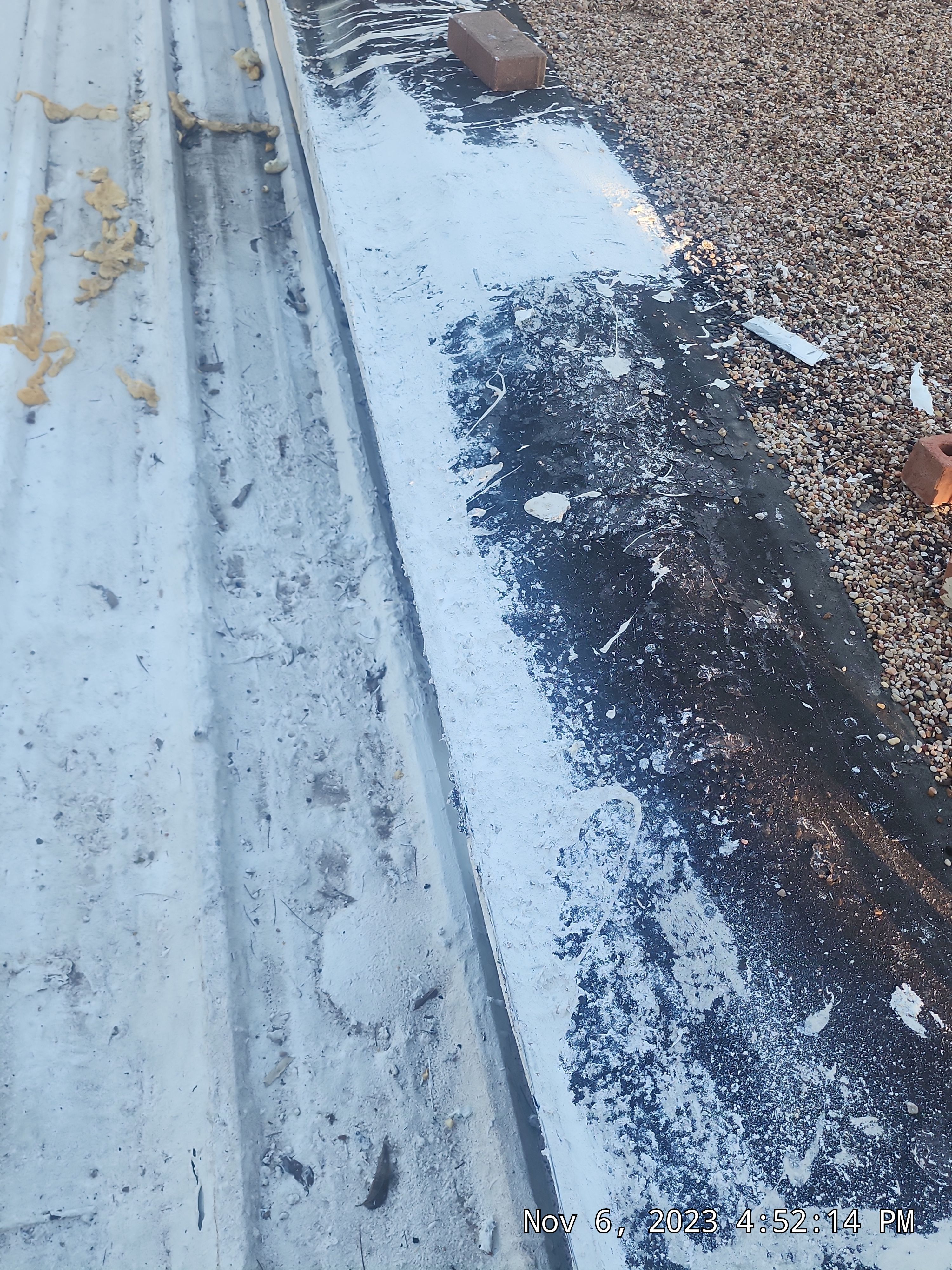 Commercial roofing overlay using GAF TPO over an old ballast roof by Becker Roofing and Exteriors