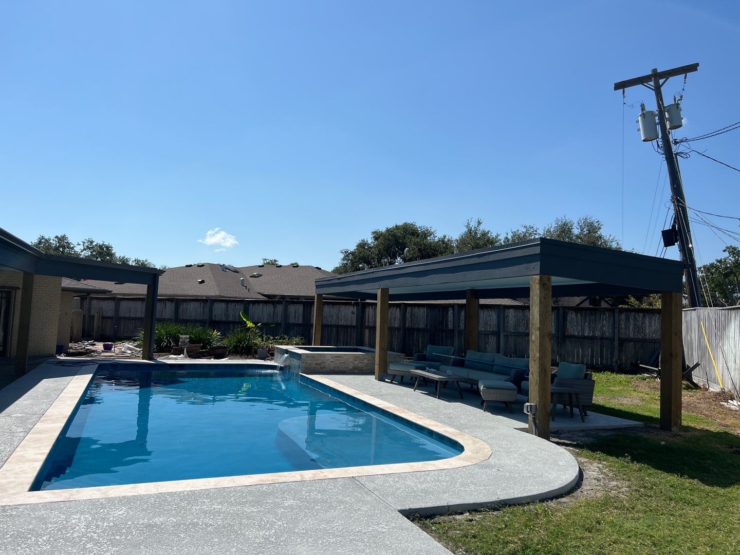 Beautiful pool side build by Bayfront Roofing and Construction