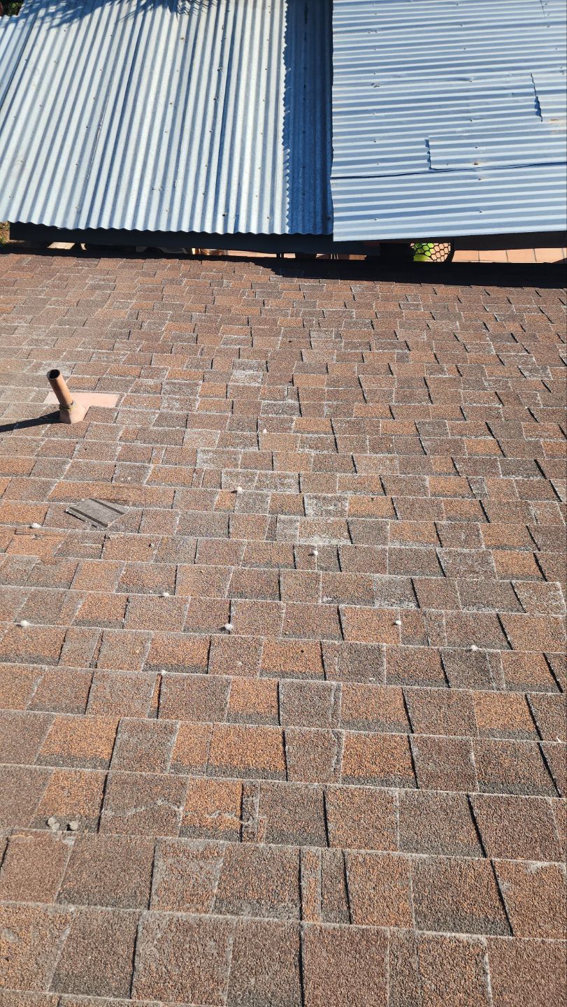 Terra Cotta Exposed Fastener by Reimagine Roofing
