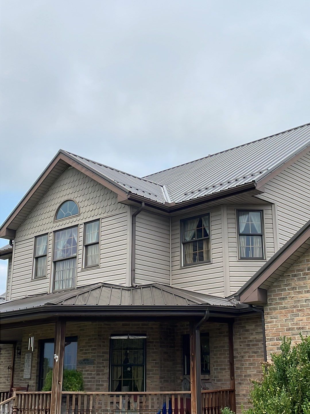 Residential Roofing Installation using Performance Panel Metal - Burnished Slate by RoofX 