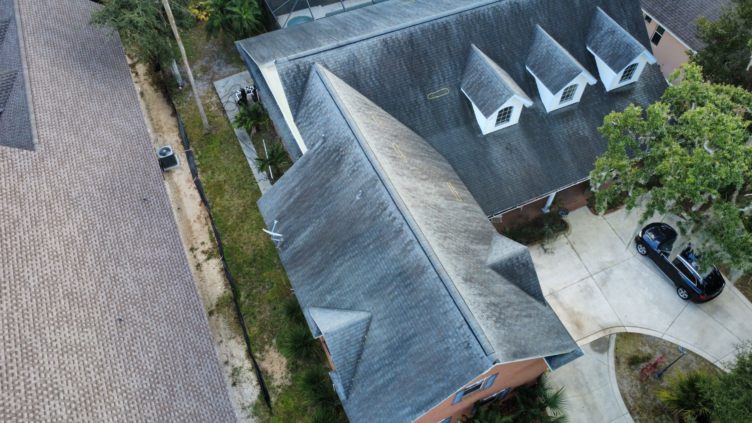 Comprehensive Onyx Black Asphalt Shingle Roof Replacement for Flagler Beach Residence by Trinity Restoration and Roofing LLC