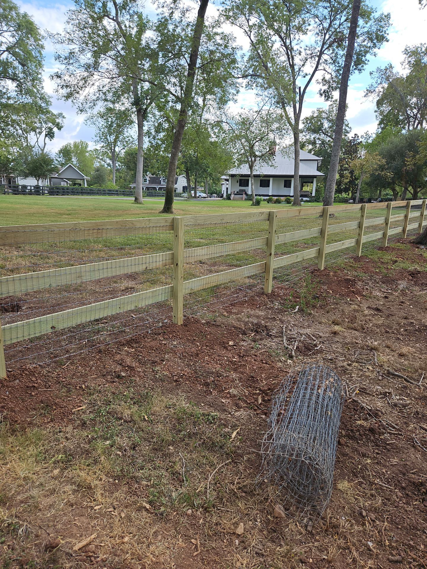 Ranch Style fence Plus Iron installation by Tim's Fences