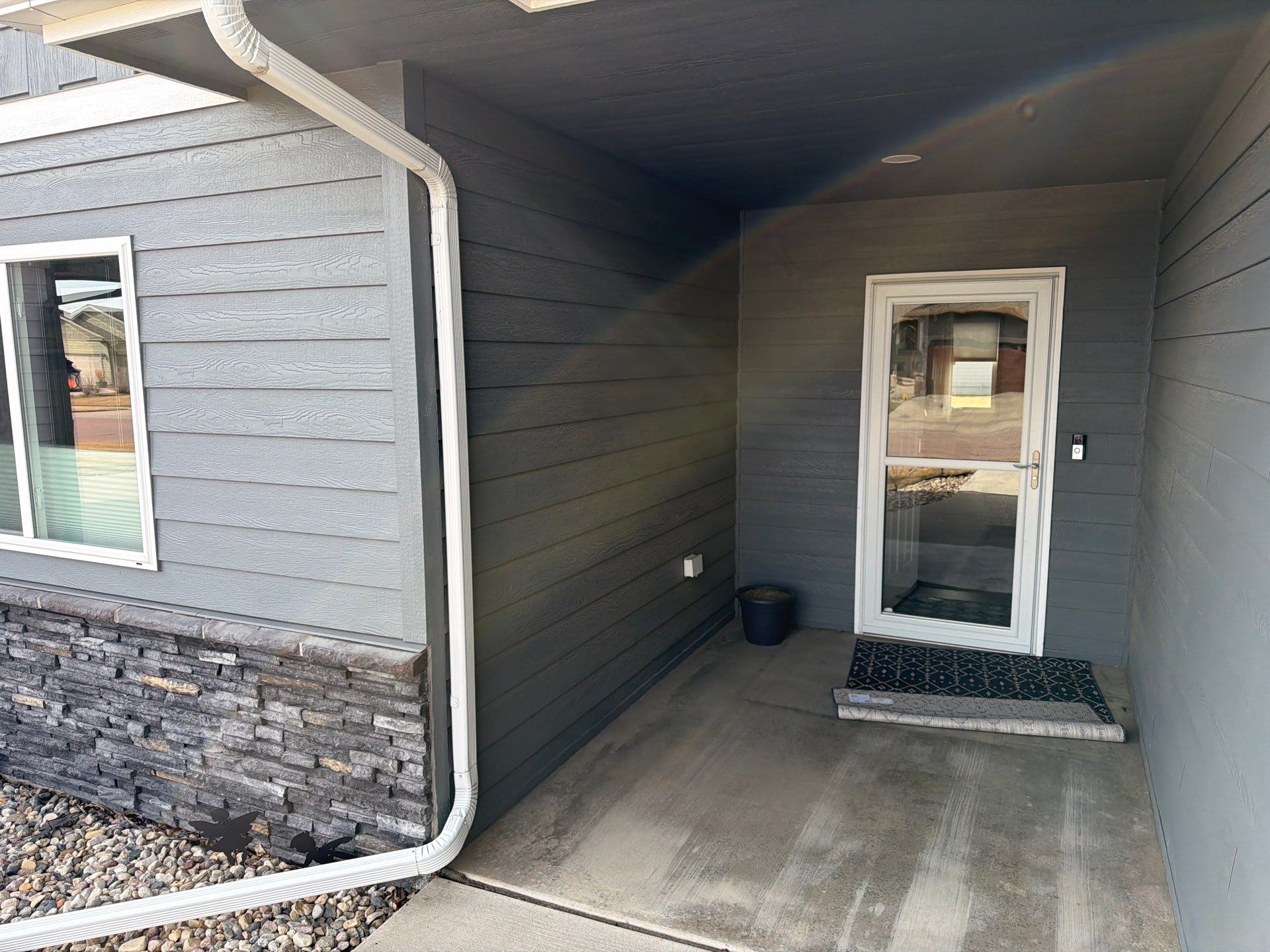 Residential Exterior Painting and Siding Refresh in Sioux Falls by Select Painting, Coatings & Garage Cabinets