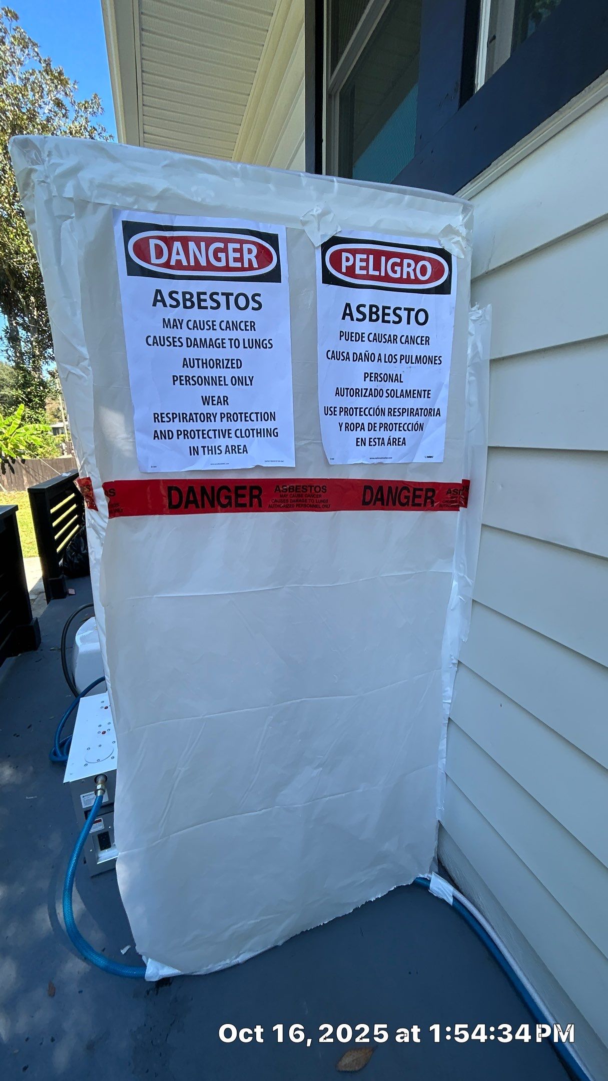 Friable asbestos ceiling abatement with air monitoring by EAS Environmental, LLC.