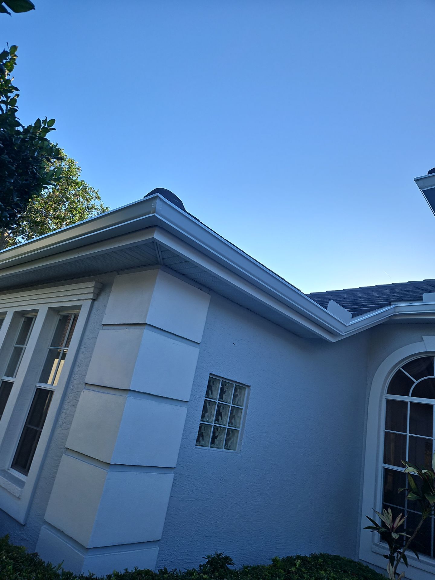 White Down Spouts using downspouts and White Seamless Gutters in Sarasota FL by Gutter Professors