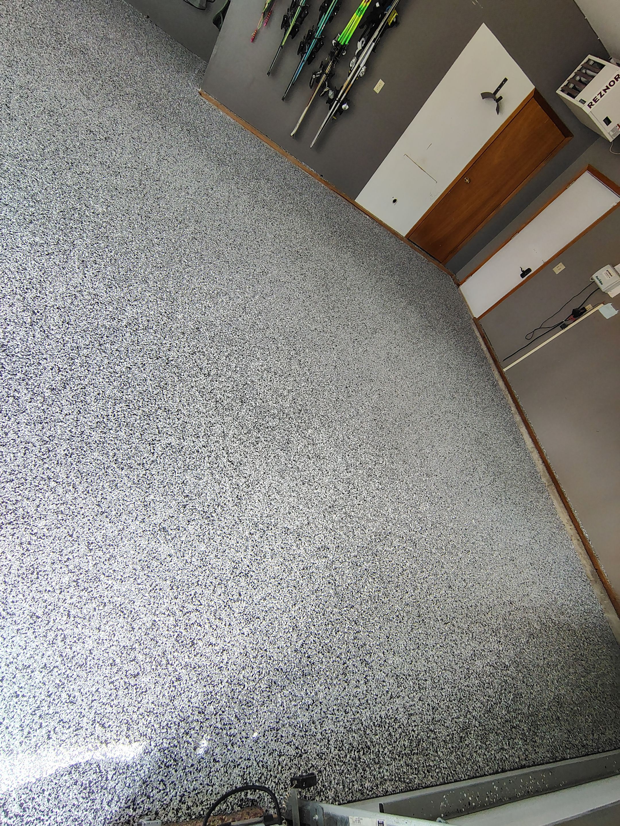 Garage Floor Concrete Coating and Crack Repair in Sioux Falls by Select Painting, Coatings & Garage Cabinets