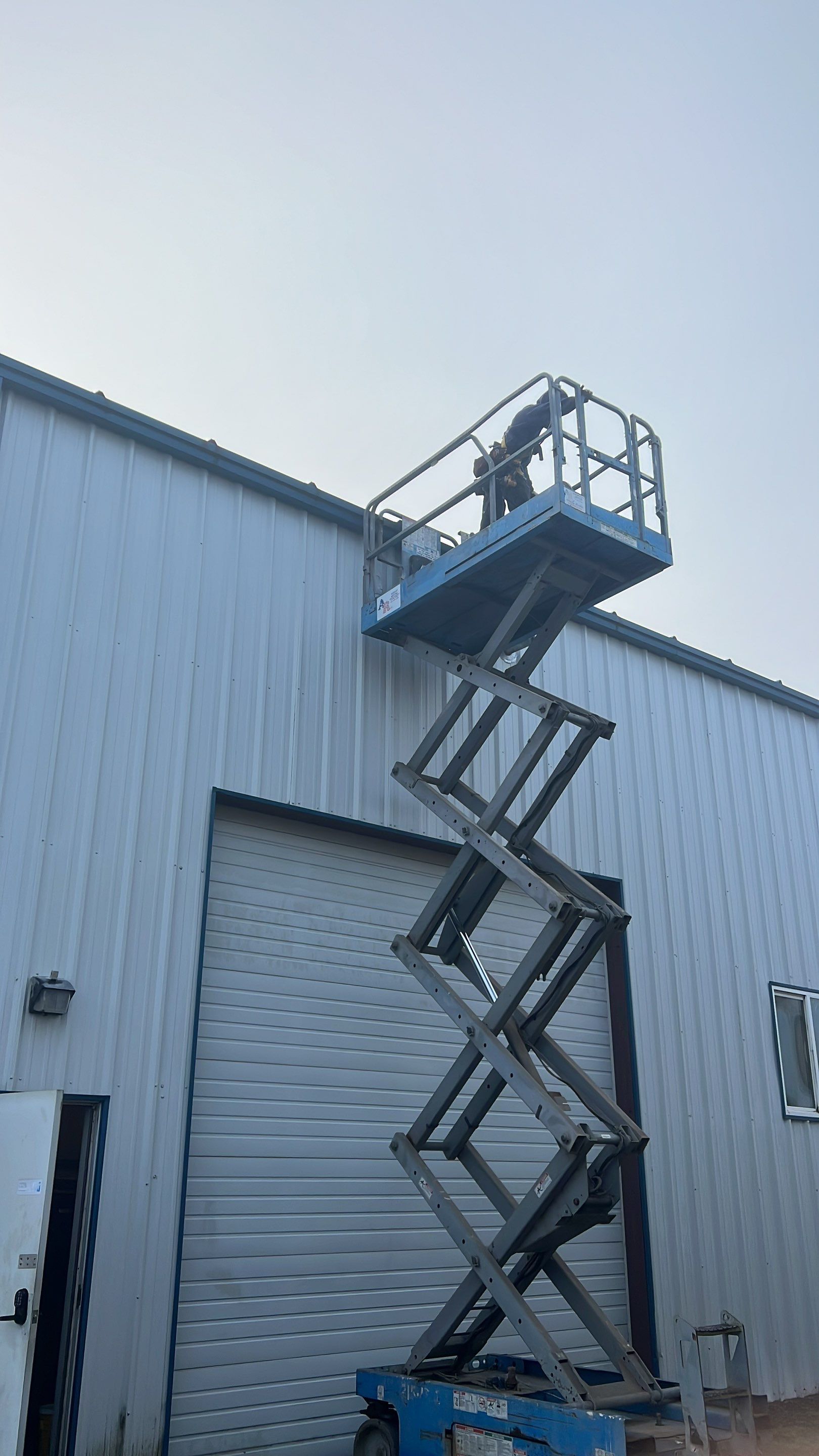 Airport Hanger Metal Roof Replacement and Insulation by Villegas Remodeling, LLC
