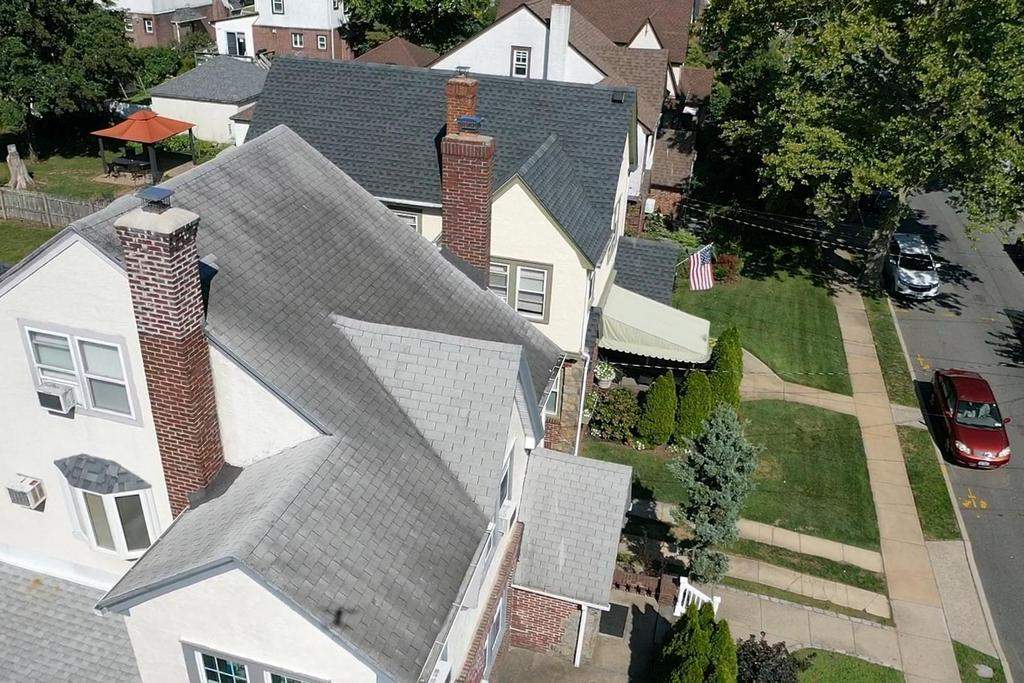 New Roof & Gutters by Island Roofing Inc.