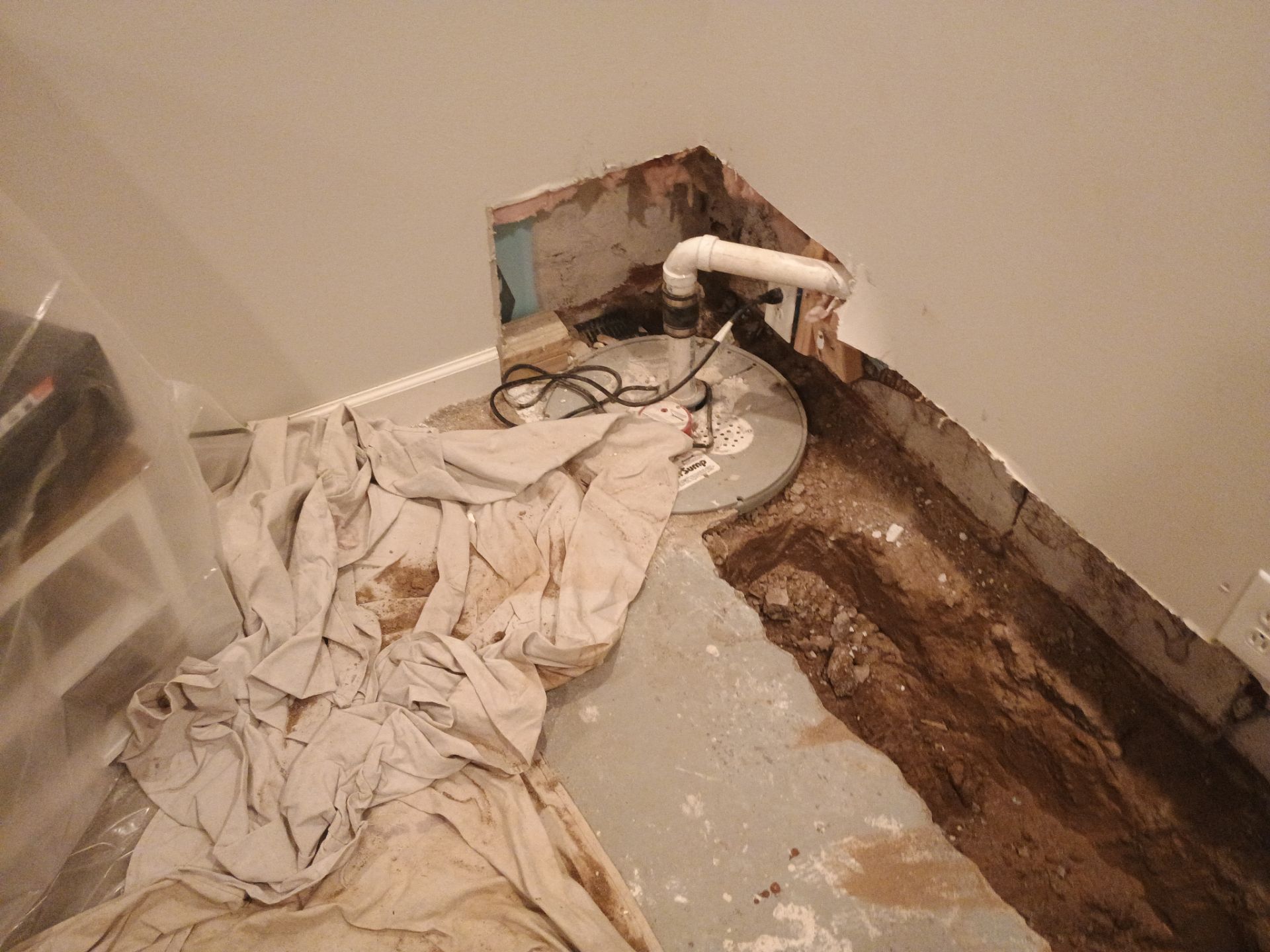 Interior Drain Tile in a Finished South Minneapolis Basement by Waterproofing Northeast