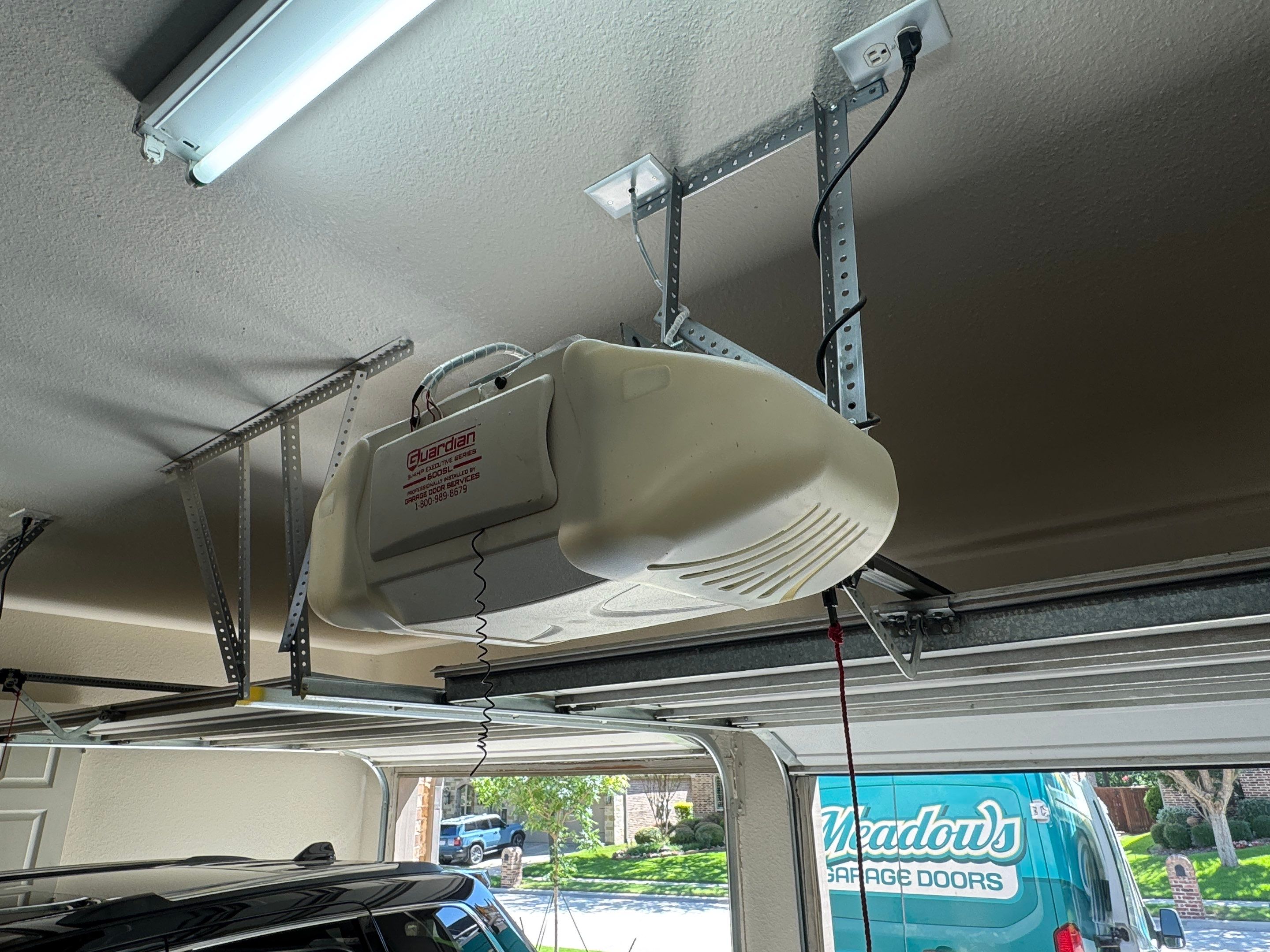 Garage Door Opener Installation and Smart Control Setup in McKinney by Meadows Garage Doors