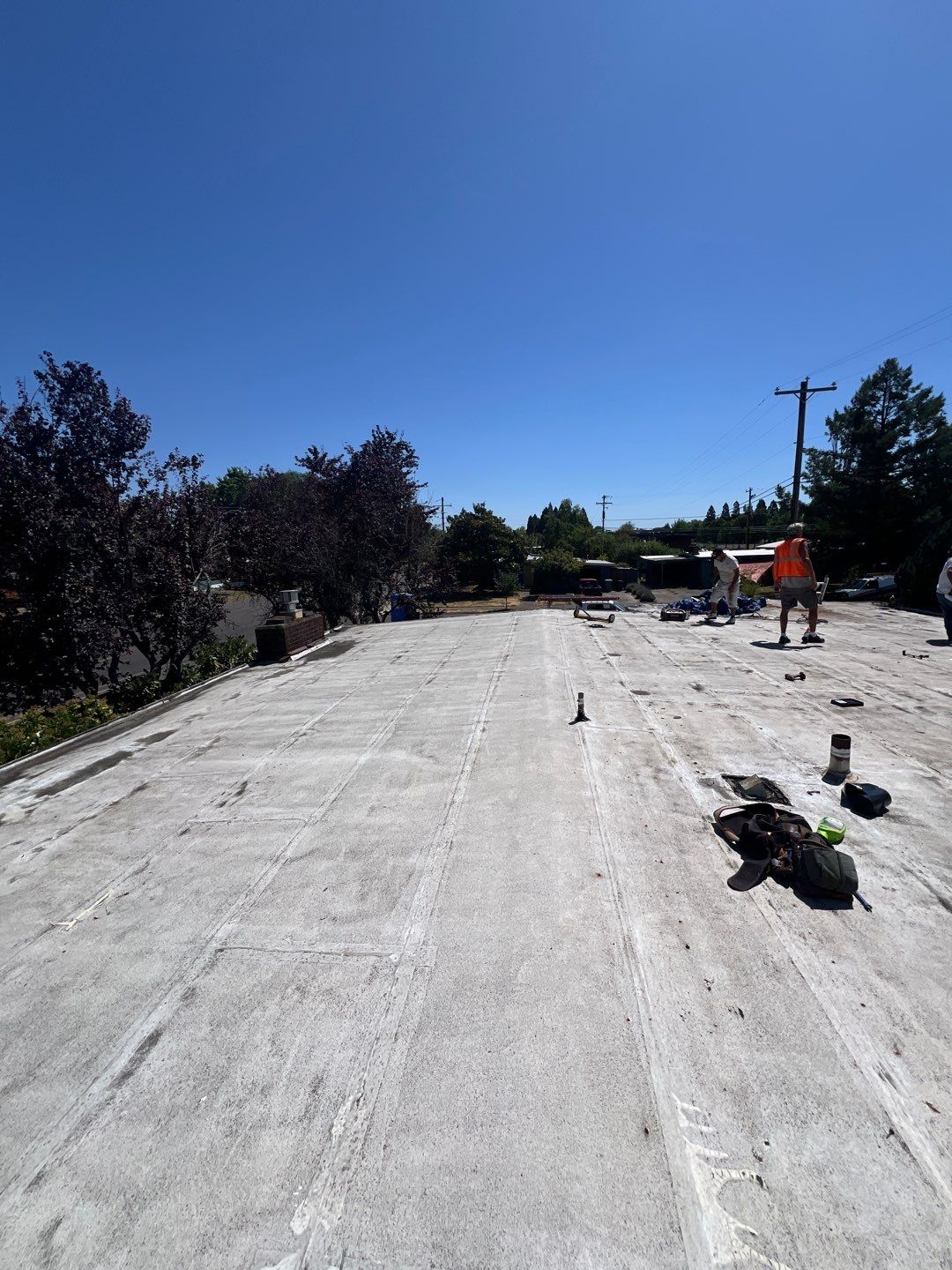 Residential Flat Roof Installation using GAF 60Mil TPO  by Orezona Building & Roofing Company, Inc.