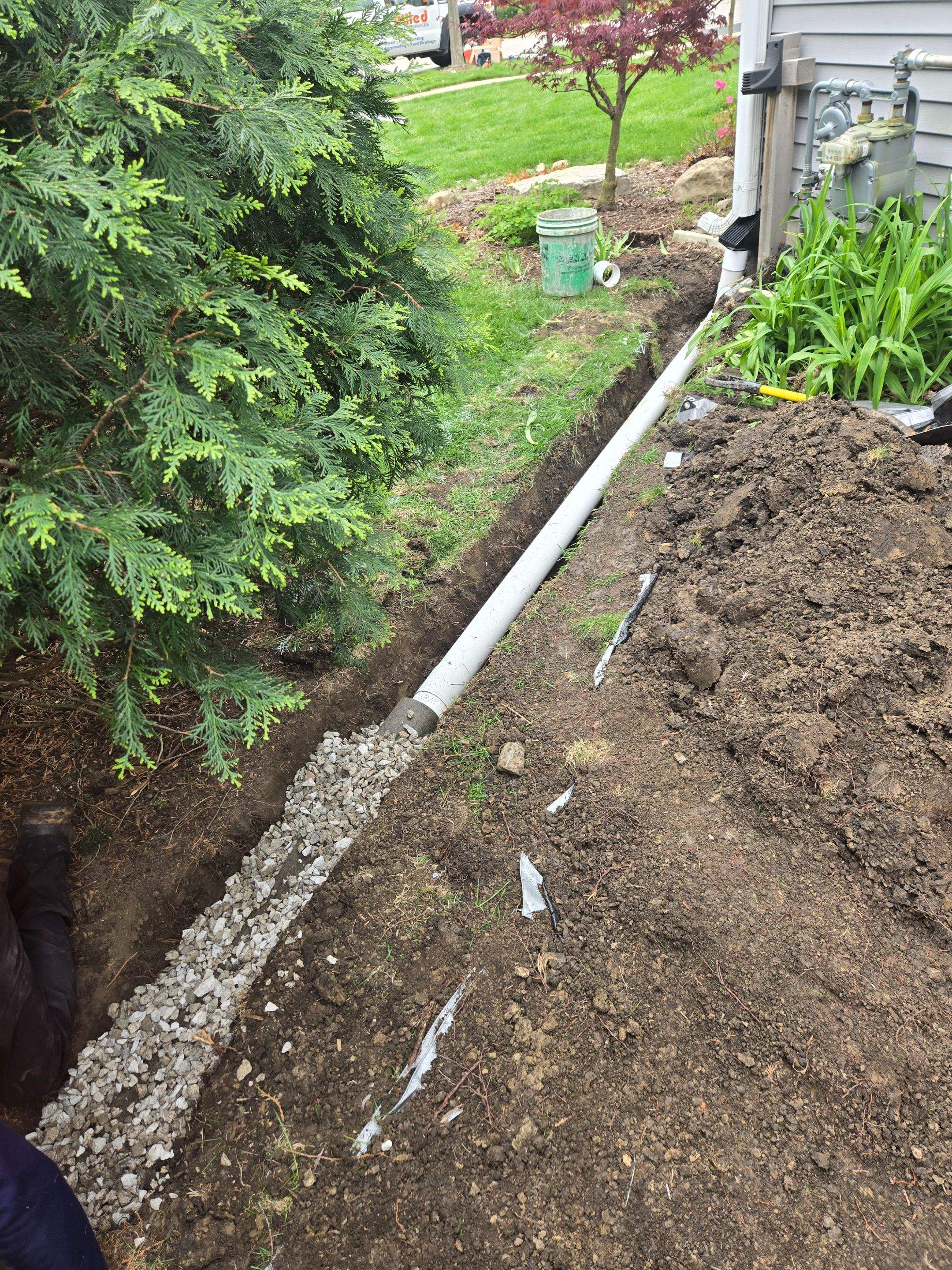 Downspout Discharge Installation & Yard Regrading by Allied Water Services